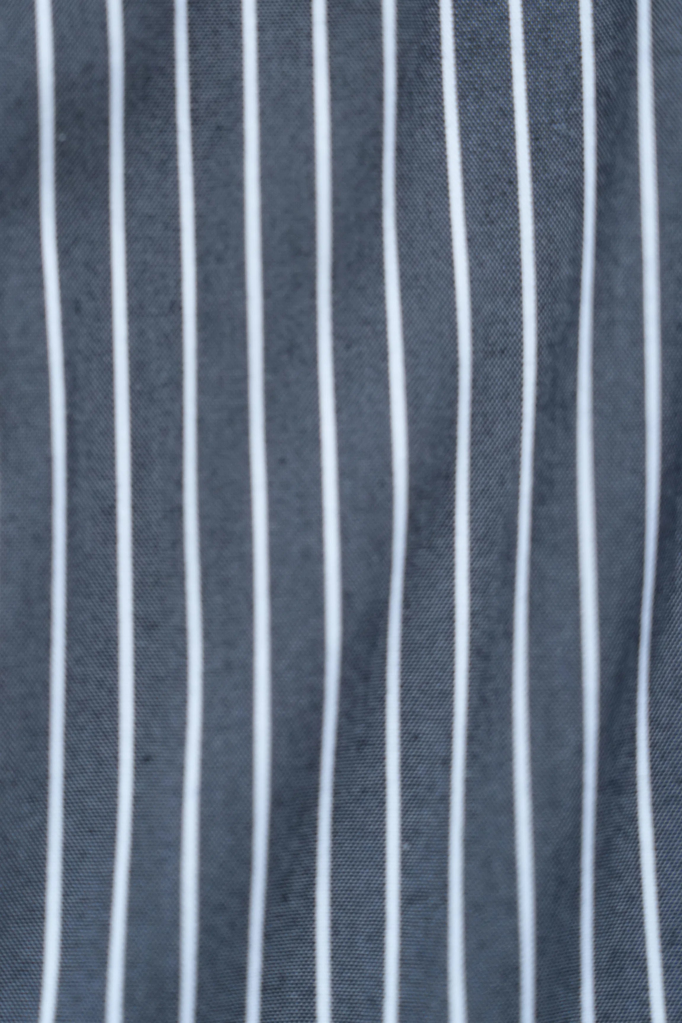Dark grey and white vertical striped fabric