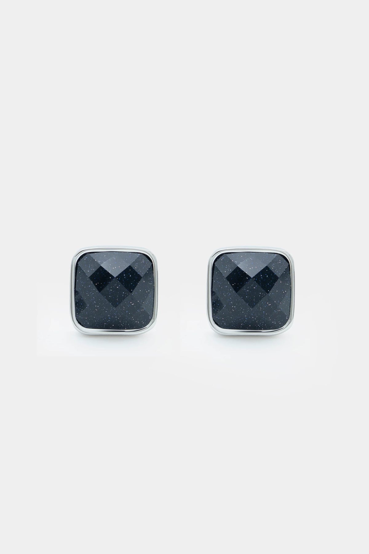 Square dark blue cufflinks with silver bezel and faceted center, pair
