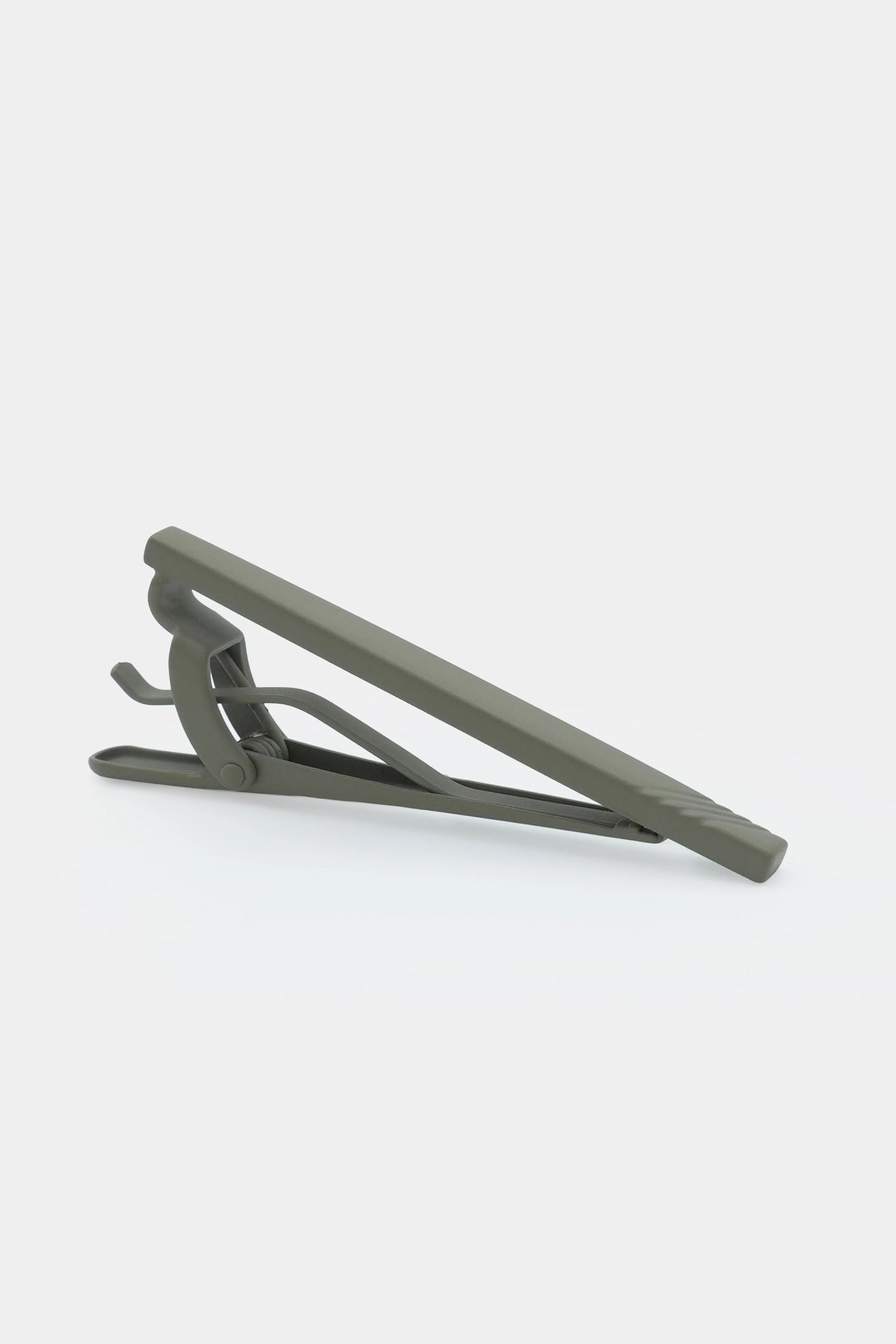 Charcoal tie pin with hinged bar and clasp, angled view