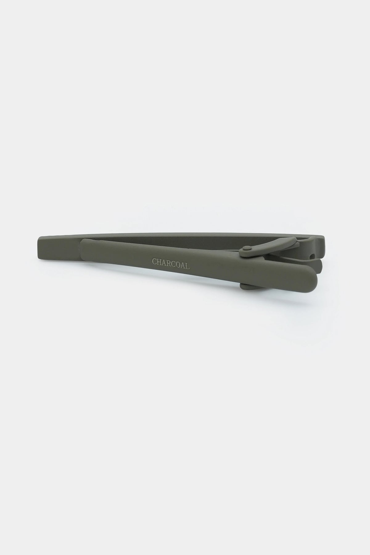 Charcoal tie pin with engraved branding on bar, front view