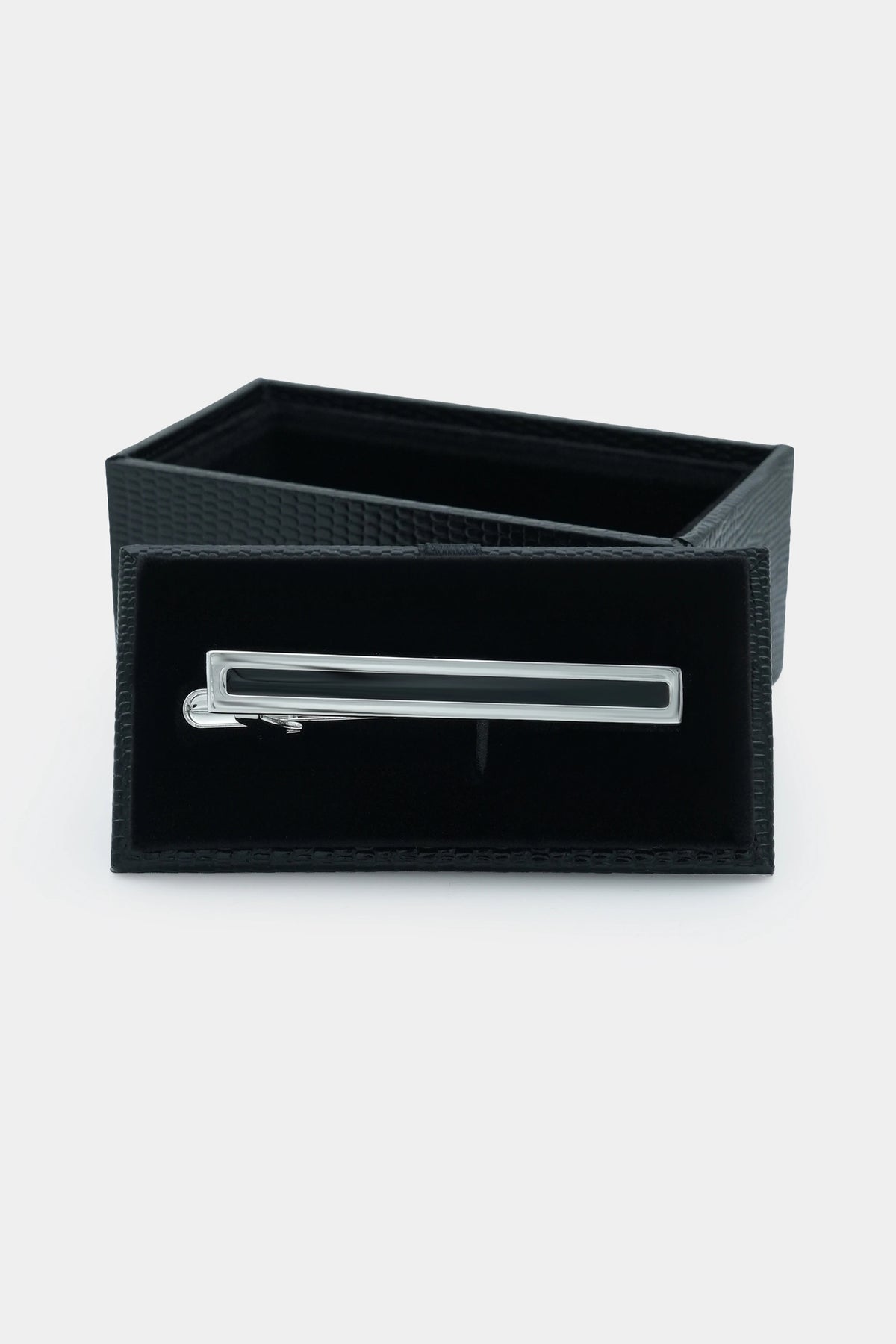 Silver tie pin in black textured gift box, open top