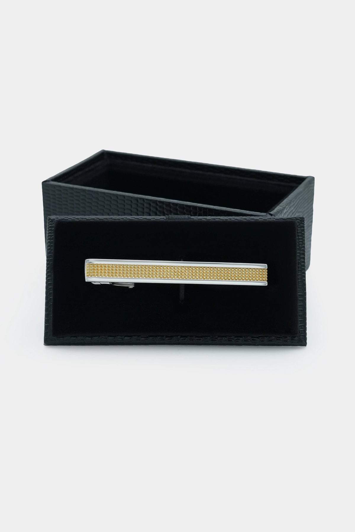 Tie pin in black gift box, silver bar with yellow rhinestone stripe