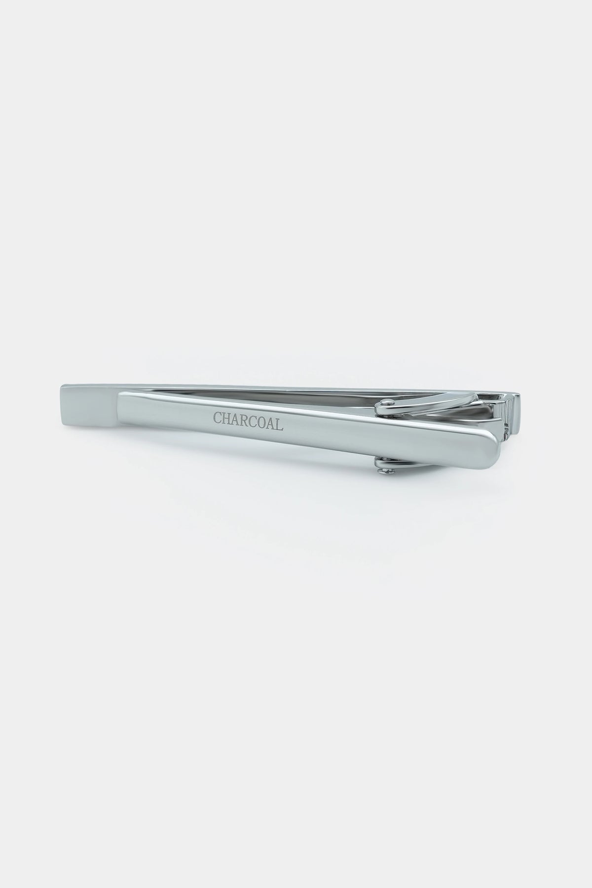 Charcoal tie pin with engraved 'CHARCOAL' and silver ridged bar clasp