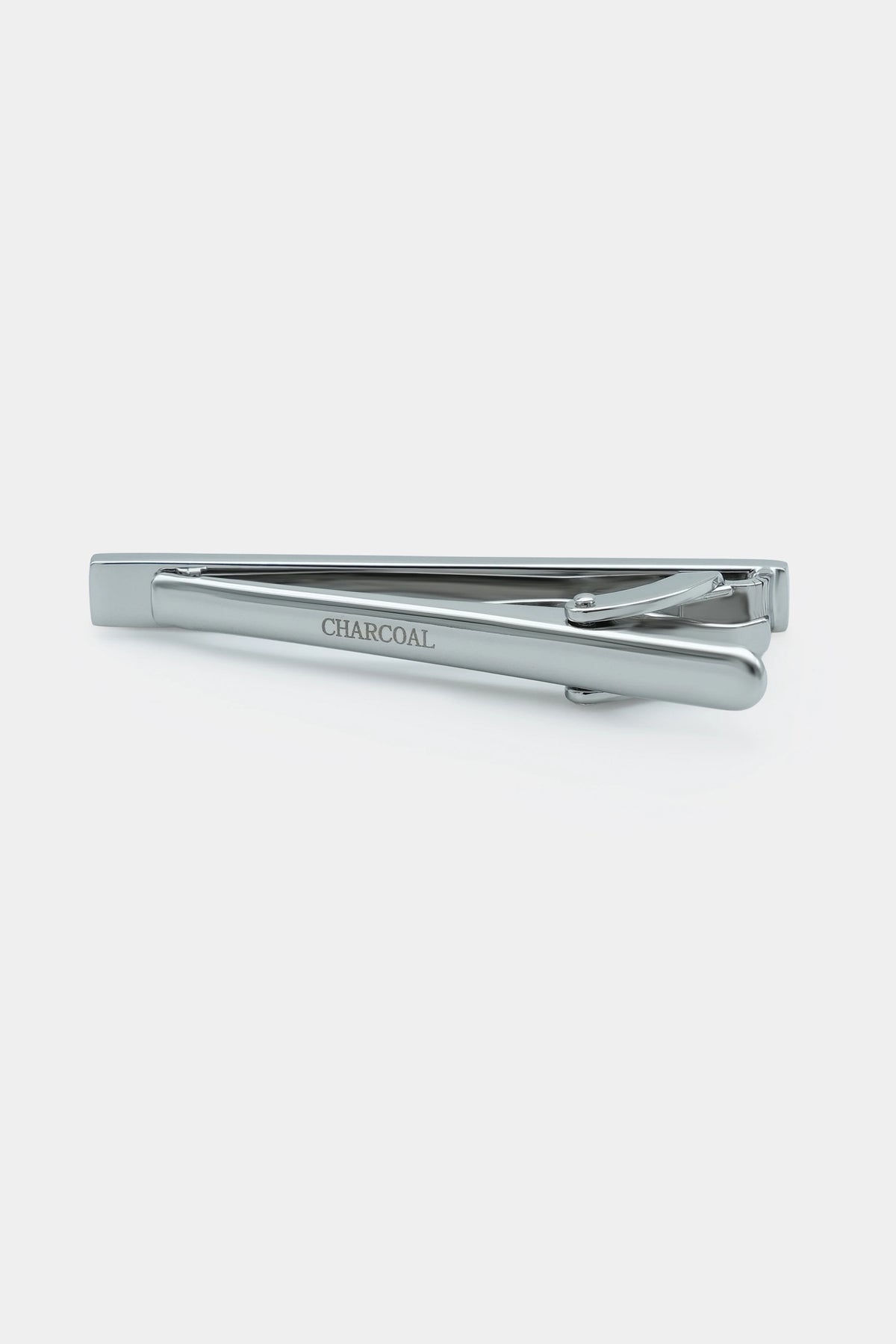 Silver tie pin bar with 'CHARCOAL' text and hinged clasp