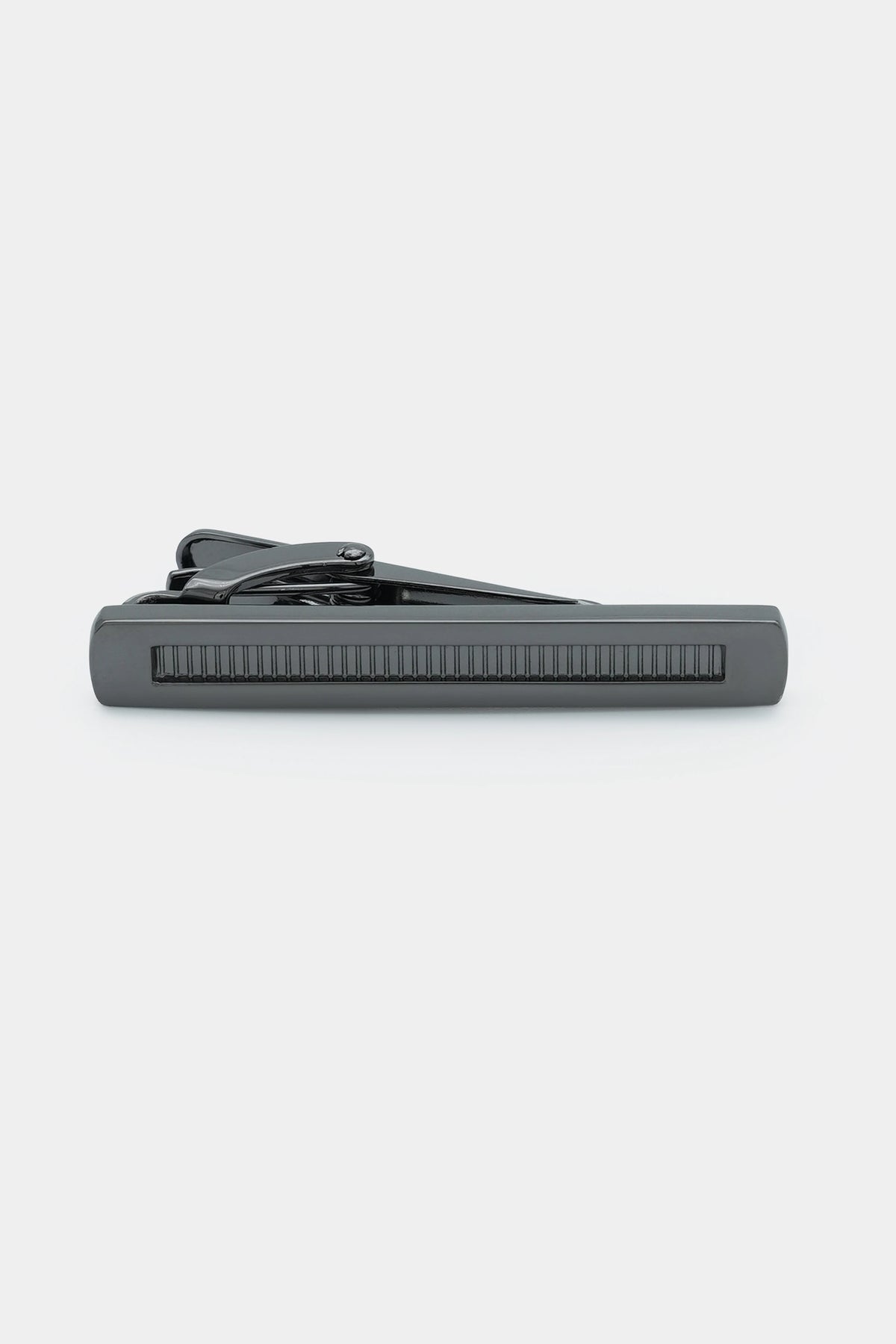 Gray tie clip with ridged front bar and hinged back clasp
