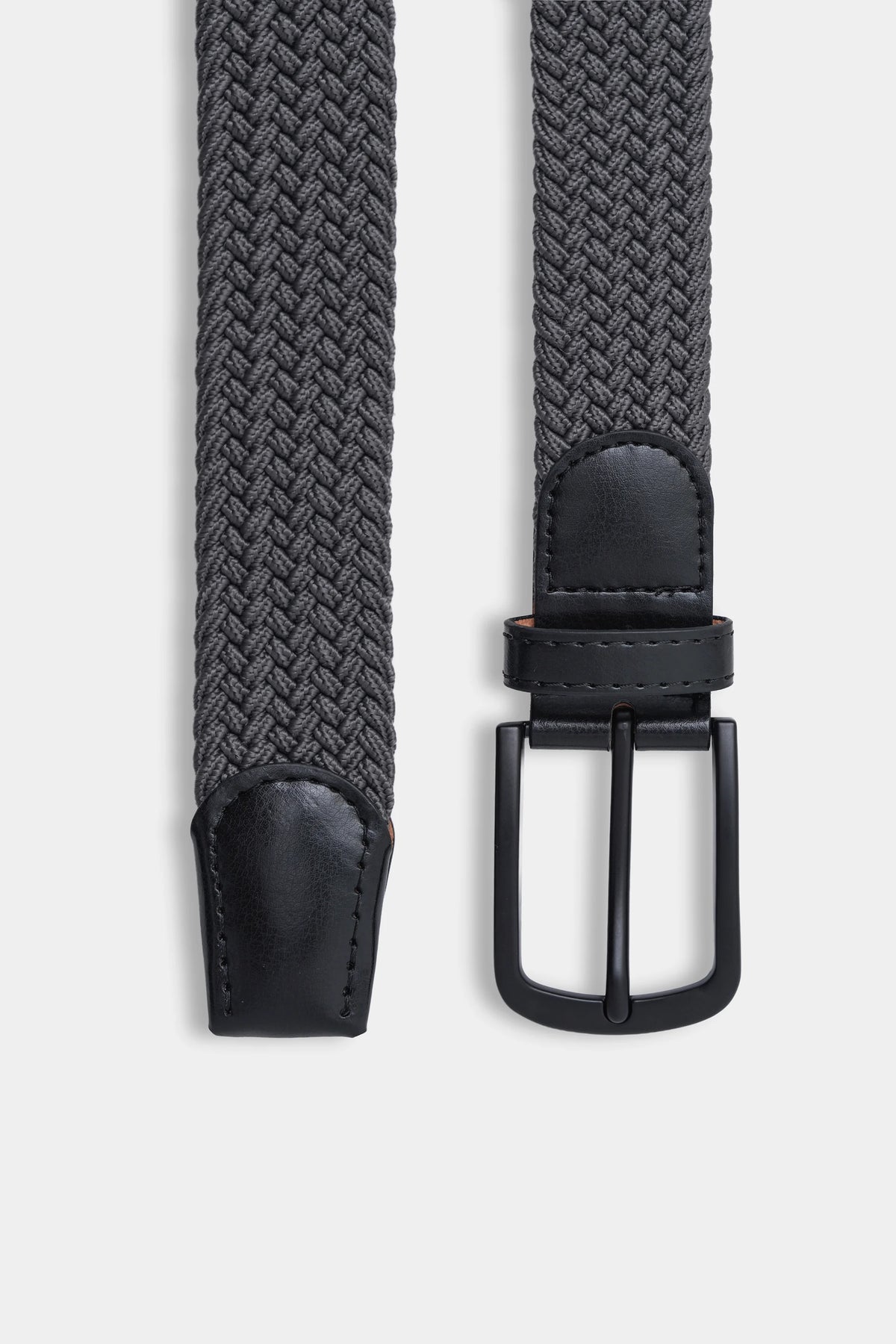 Woven belt with metal loop buckle and black leather strap ends
