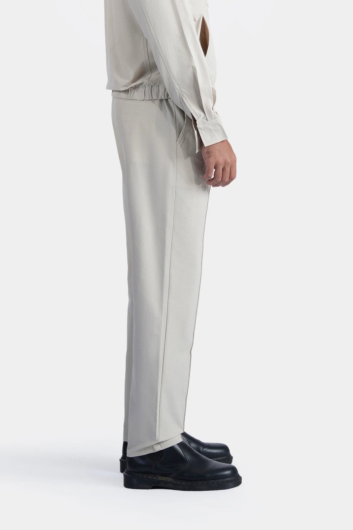 Beige seersucker tailored trousers, tapered legs and side pockets