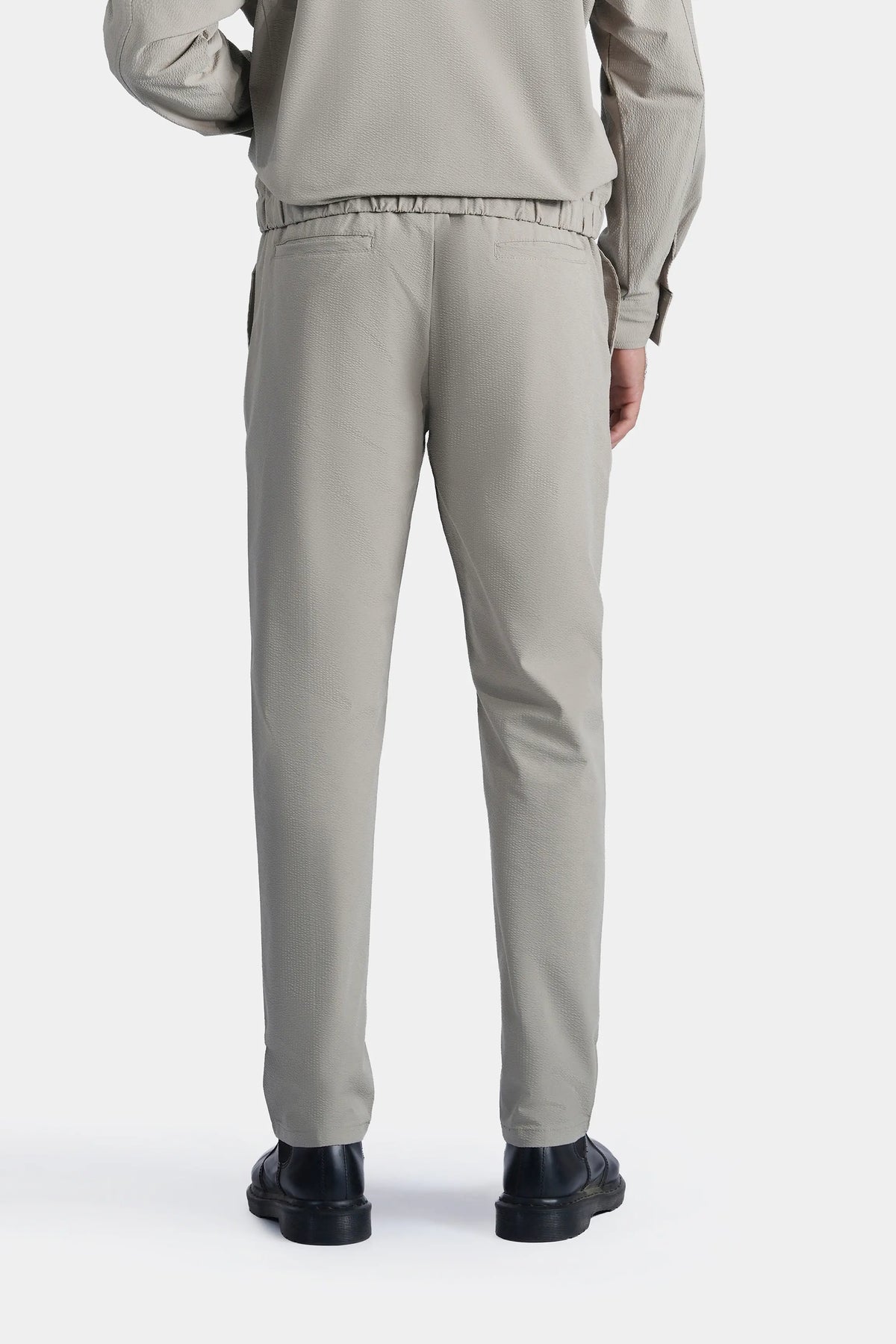 Smart Fit seersucker trousers in pistachio green, back view with relaxed straight leg