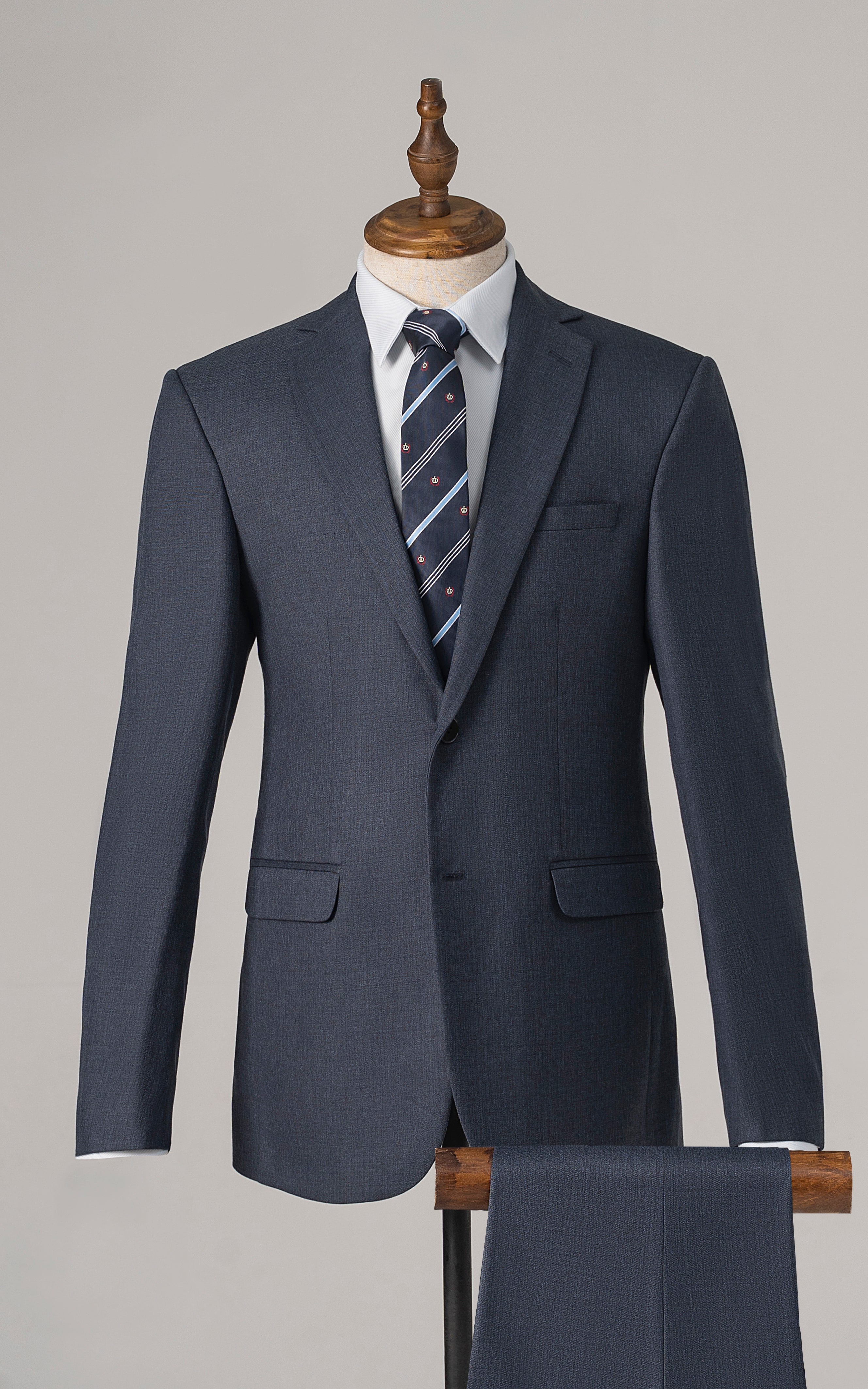 Blue 3-piece suit jacket and vest with striped tie and white dress shirt
