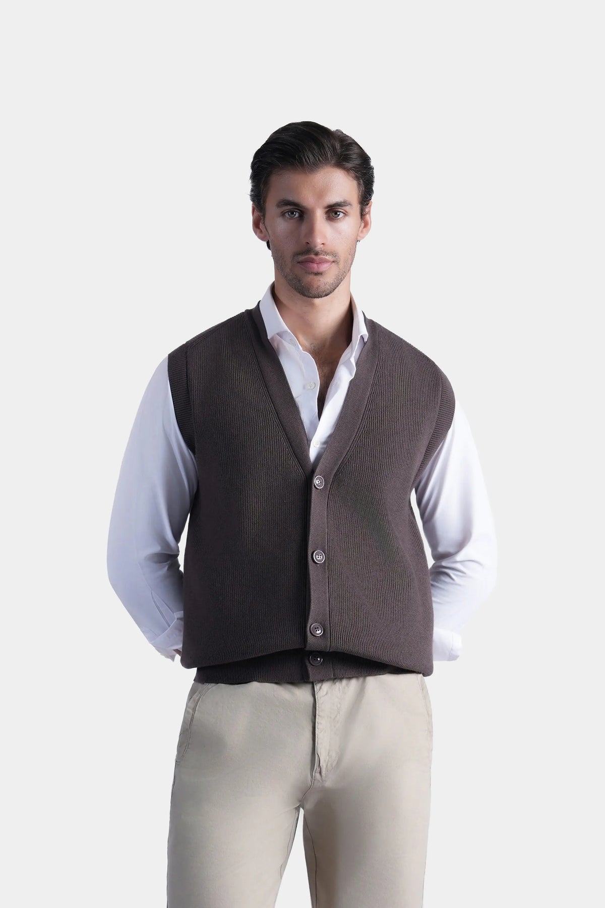 Brown knit V-neck sleeveless sweater vest with button placket