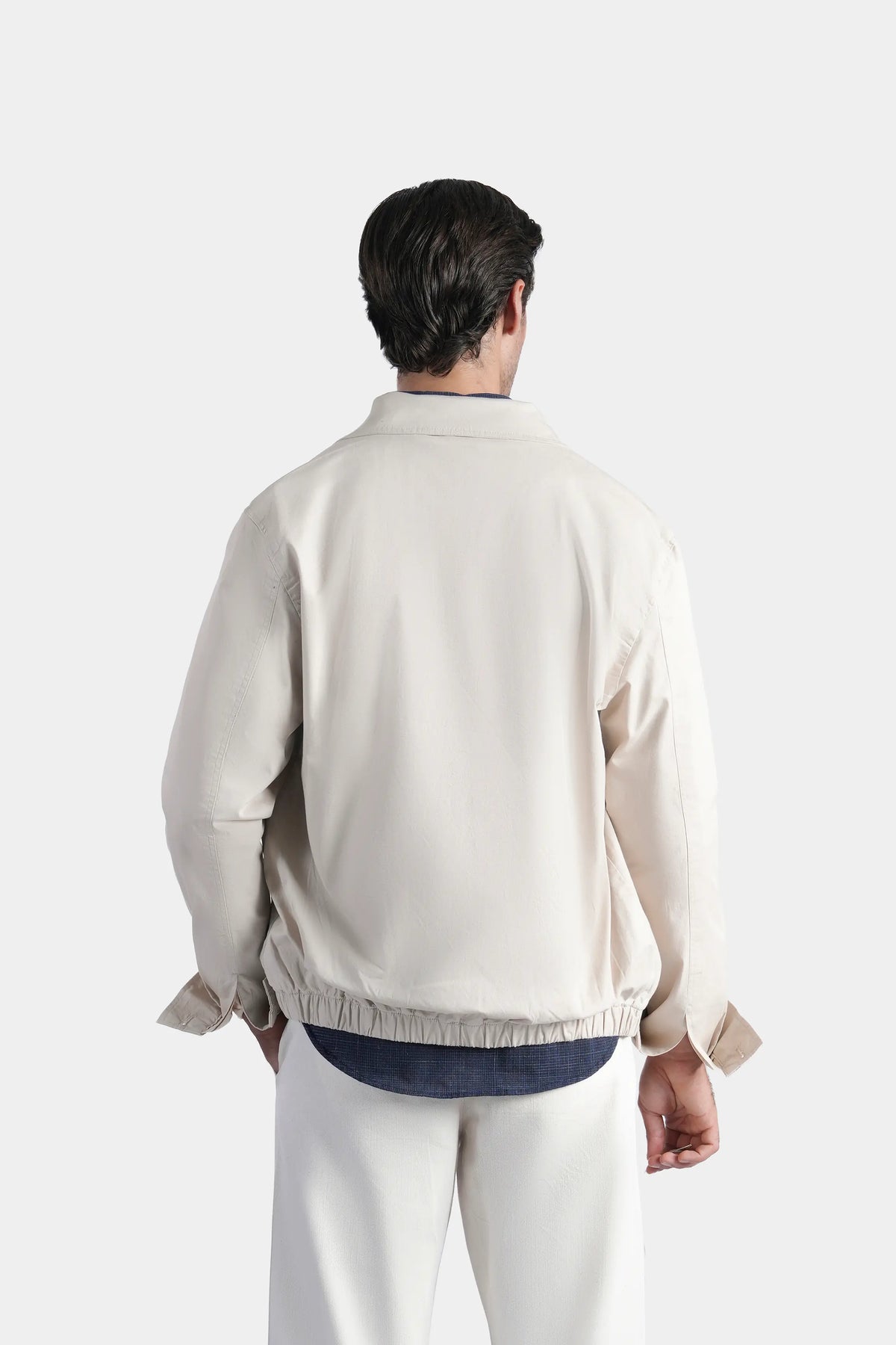 Beige relaxed-fit full-sleeve jacket, back view with stand collar