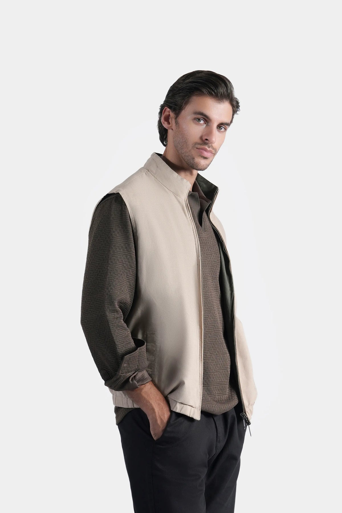 Reversible sleeveless jacket, khaki side with zip front and stand collar