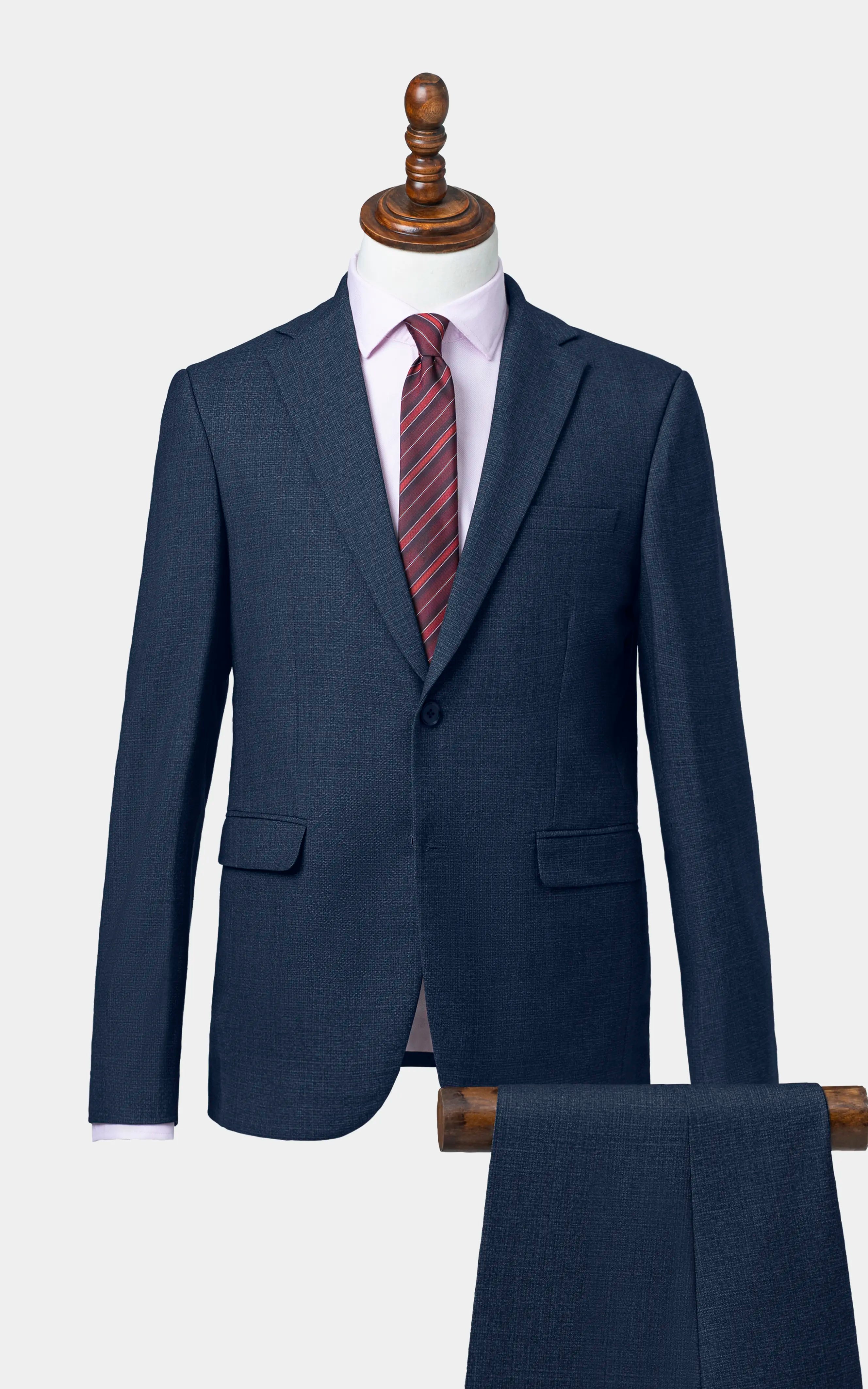 Navy two-piece suit jacket and matching trousers, notched lapel, two front pockets