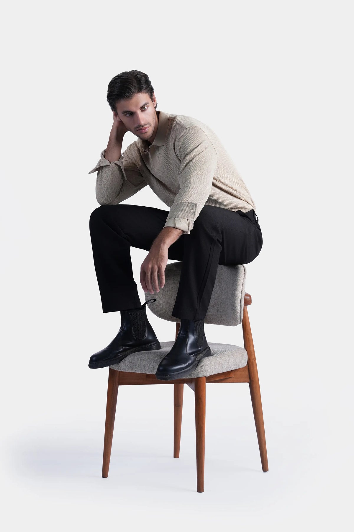 Khaki long-sleeve polo shirt, self-textured fabric and collar, side view