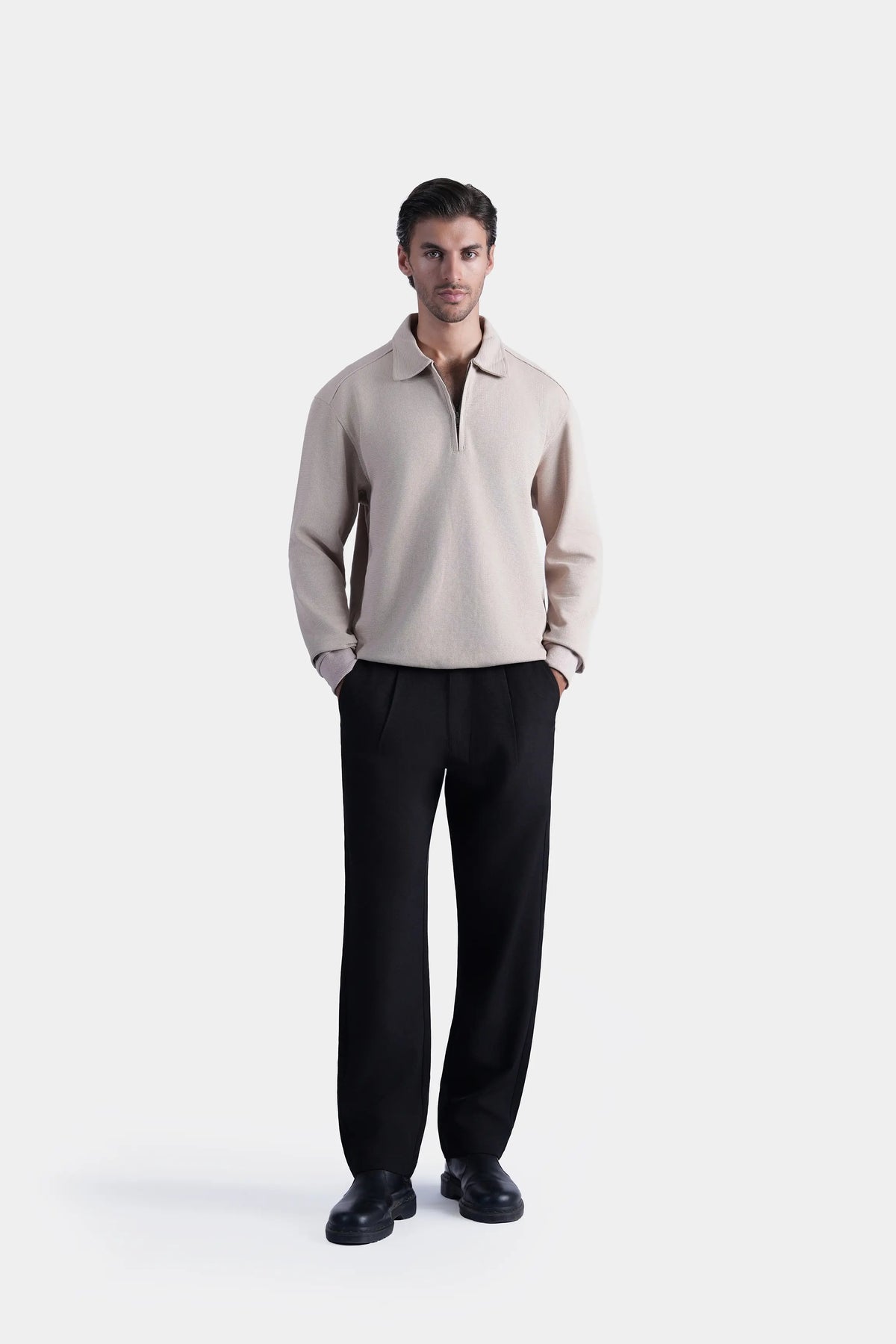 Beige long-sleeve zip polo shirt with ribbed collar and cuffs
