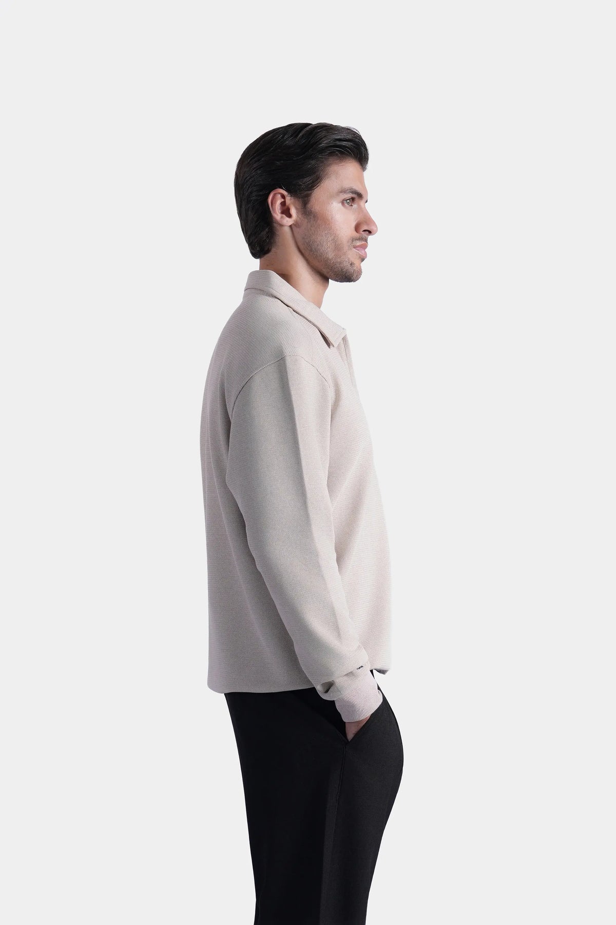 Beige long-sleeve polo shirt with full zipper and ribbed cuffs