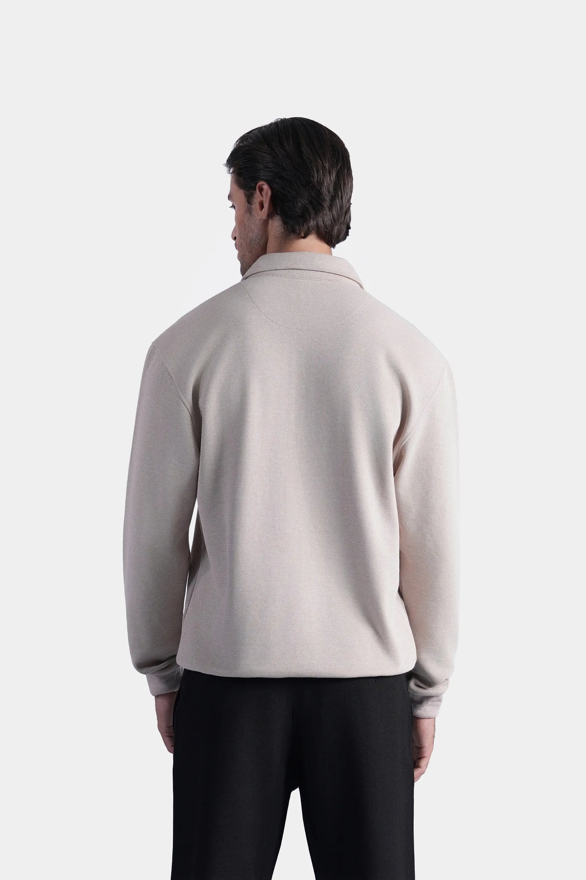 Beige long-sleeve polo shirt with full-length zipper; plain back