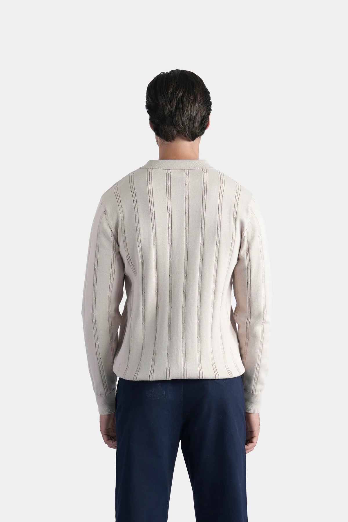 Beige back view knit sweater with regular collar and vertical ribbed panels
