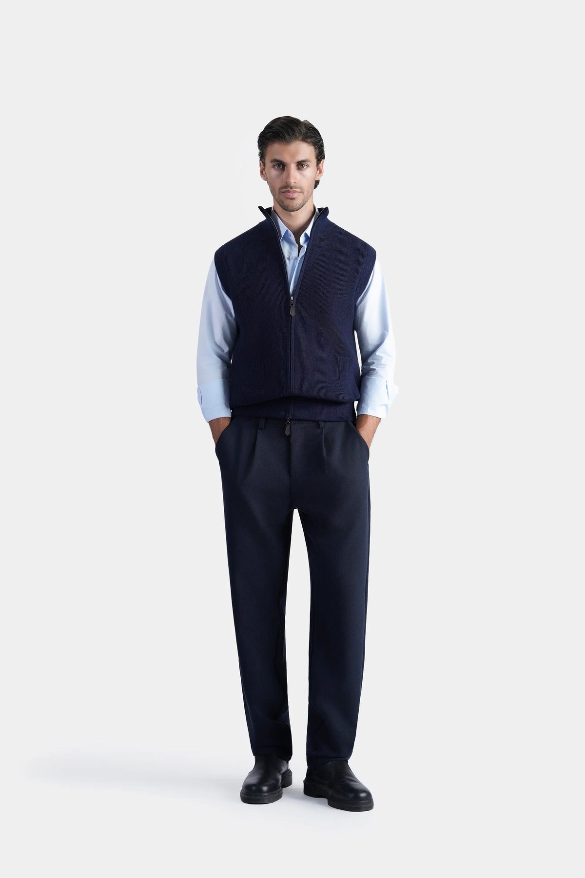 Navy sleeveless knitted sweater with high stand collar and zip front, men's