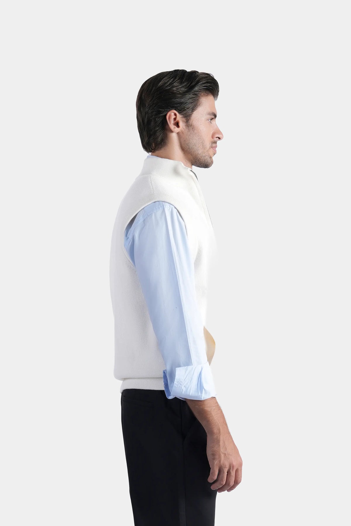 Off-white sleeveless knit sweater vest, high stand collar, zipper front