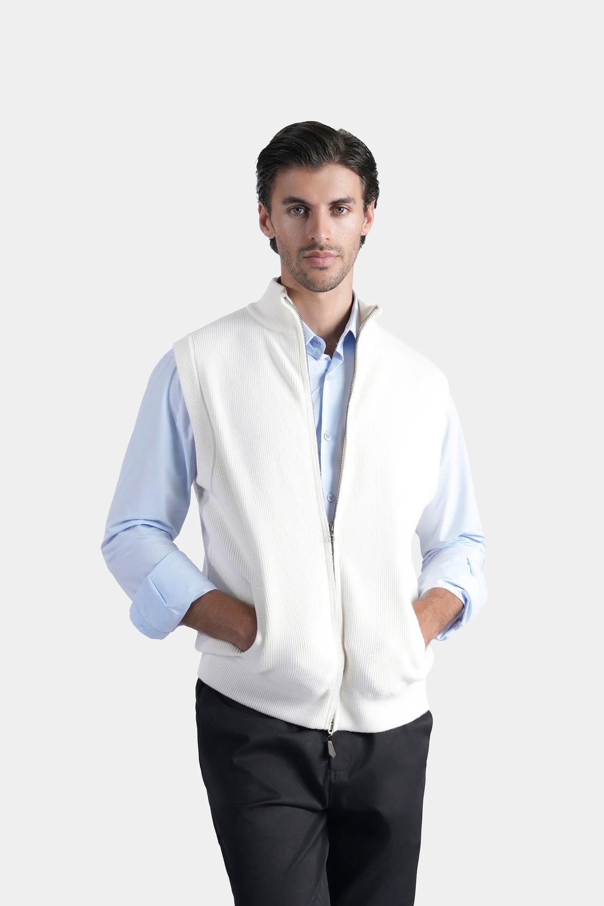 Off-white sleeveless knit sweater vest with high stand collar and zipper