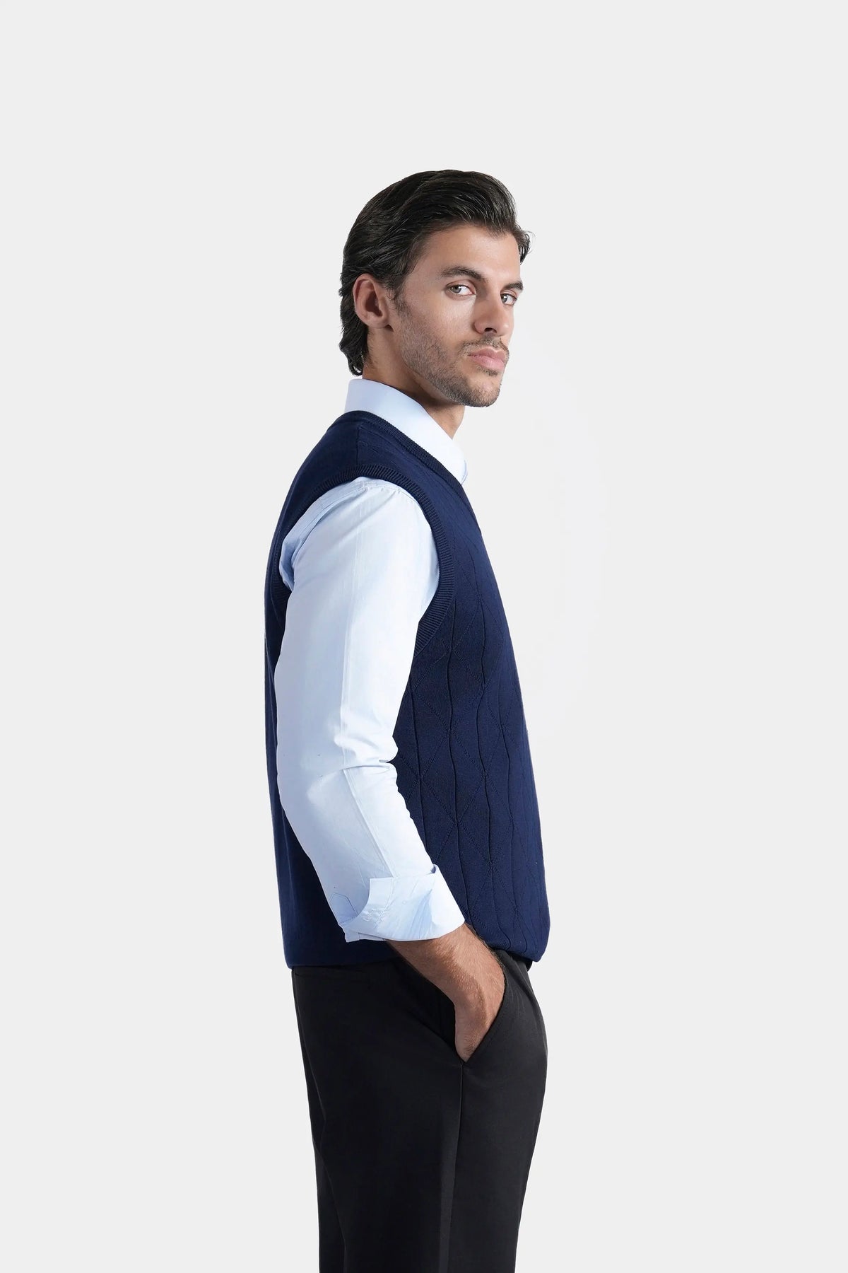 Navy V-neck sleeveless knit sweater, side profile