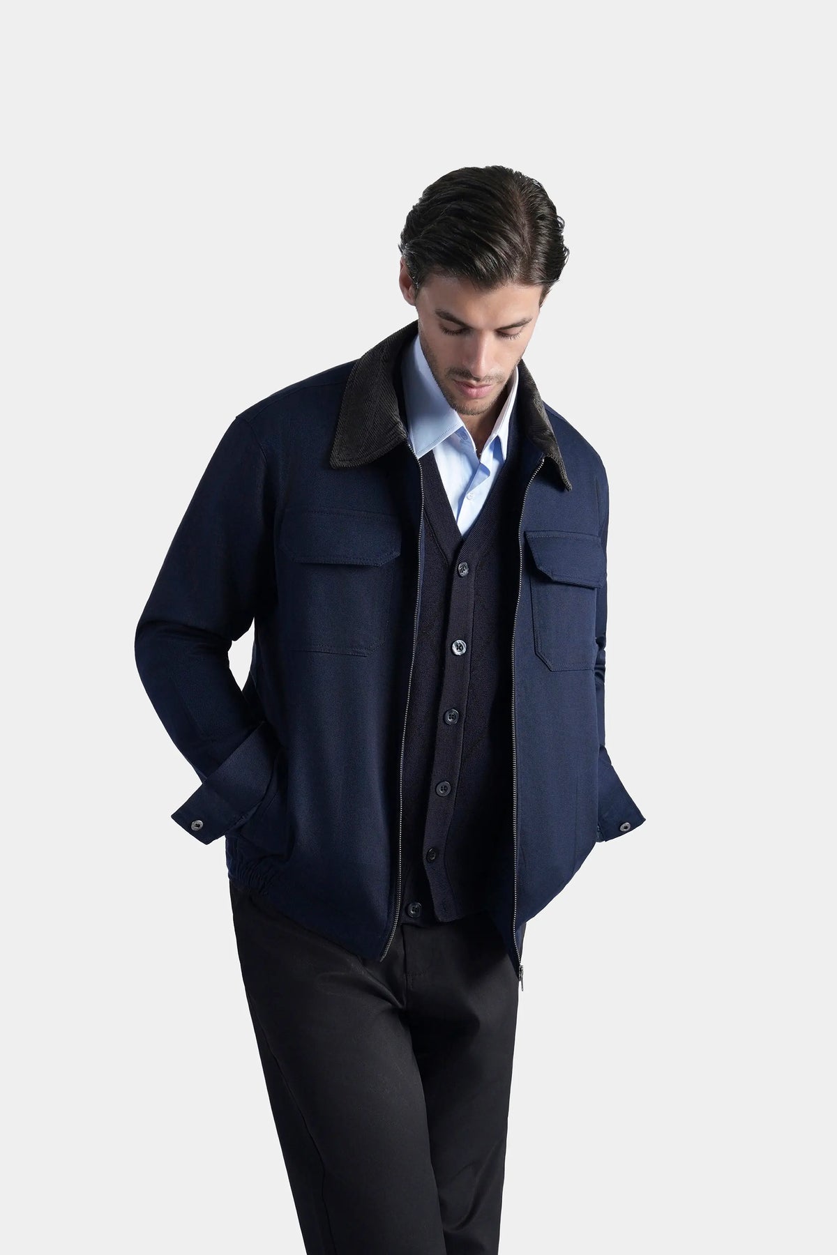Relax fit navy full-sleeve jacket with dark collar and chest flap pockets