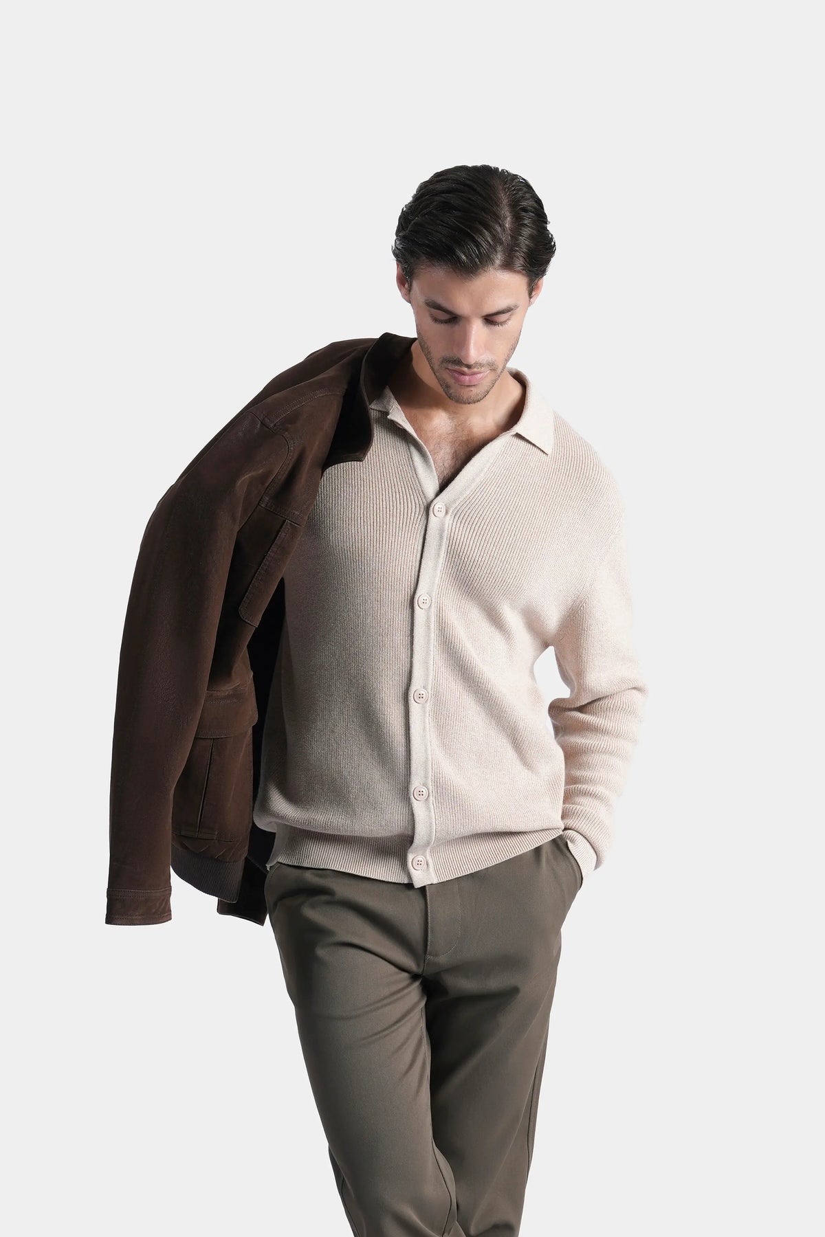 Beige knitted long-sleeve cardigan with button front, angled front view