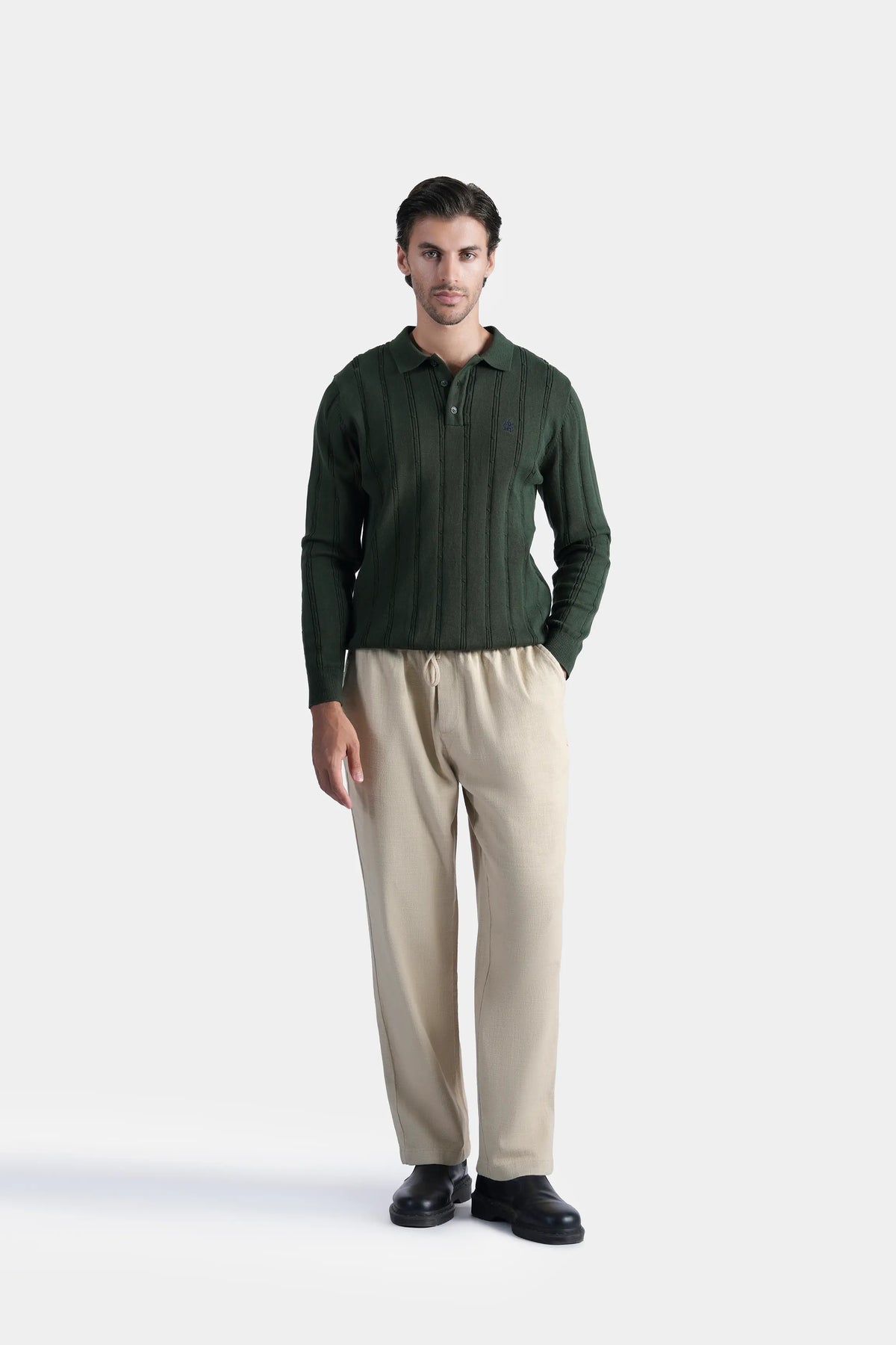 Men's dark green button-front cable knit sweater with regular collar and long sleeves