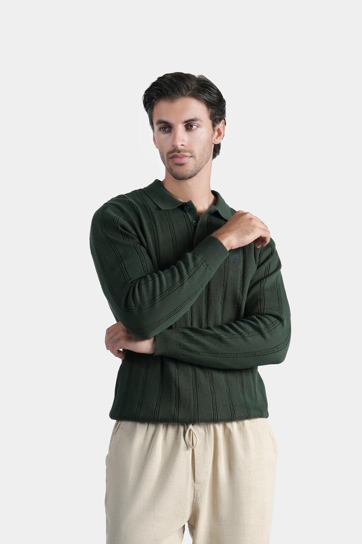 Men's dark green cable knit sweater with button-up collar and long sleeves