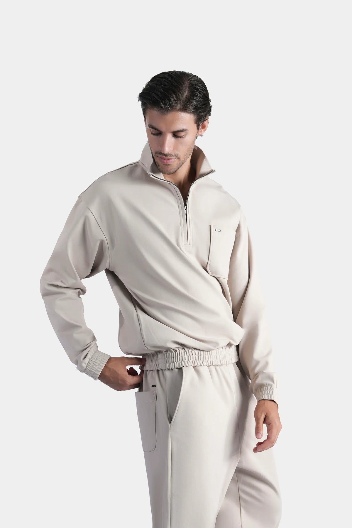 Beige quarter-zip mock neck scuba sweatshirt with long sleeves