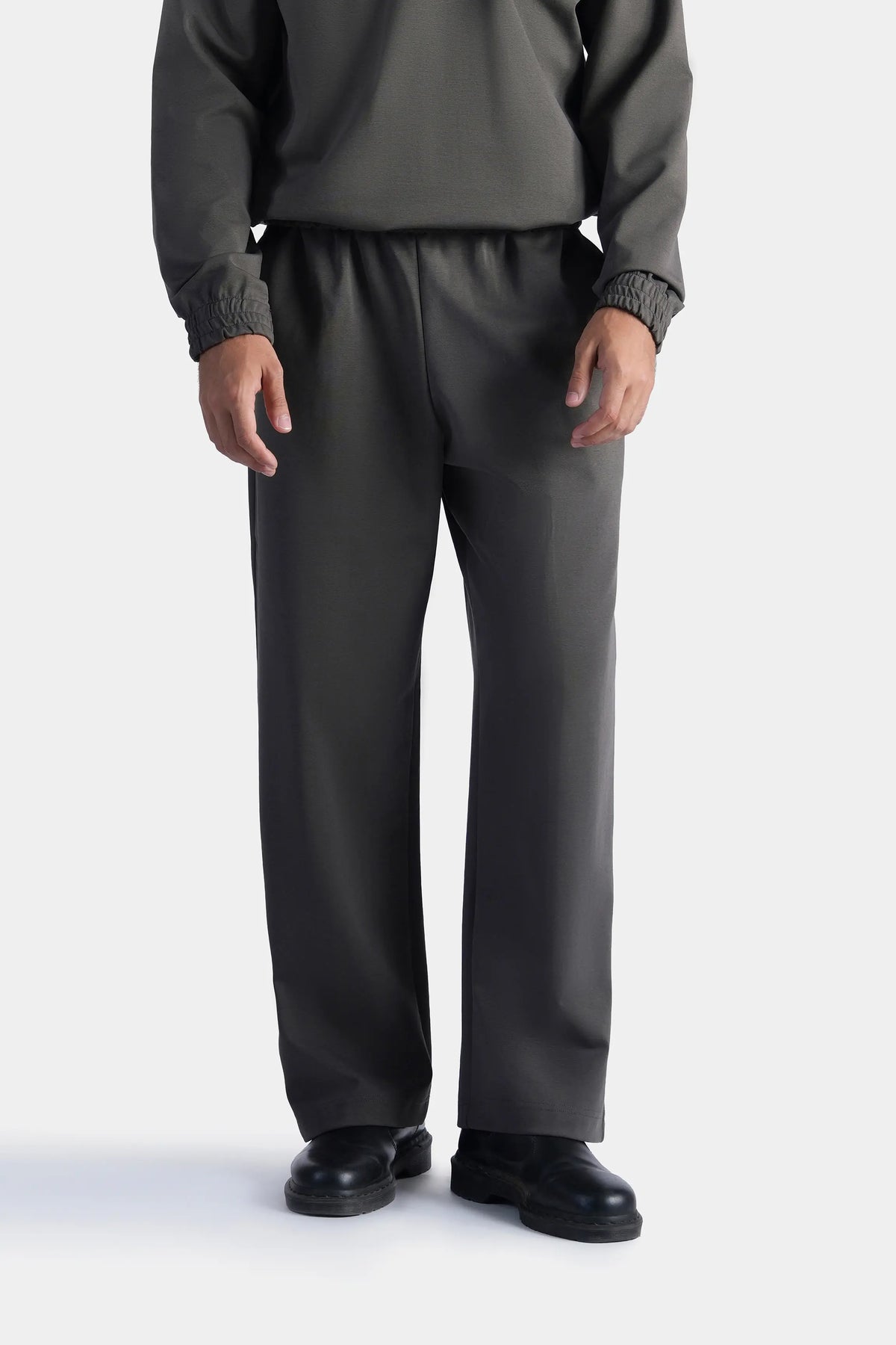 Grey scuba trousers with elastic waistband and straight relaxed legs