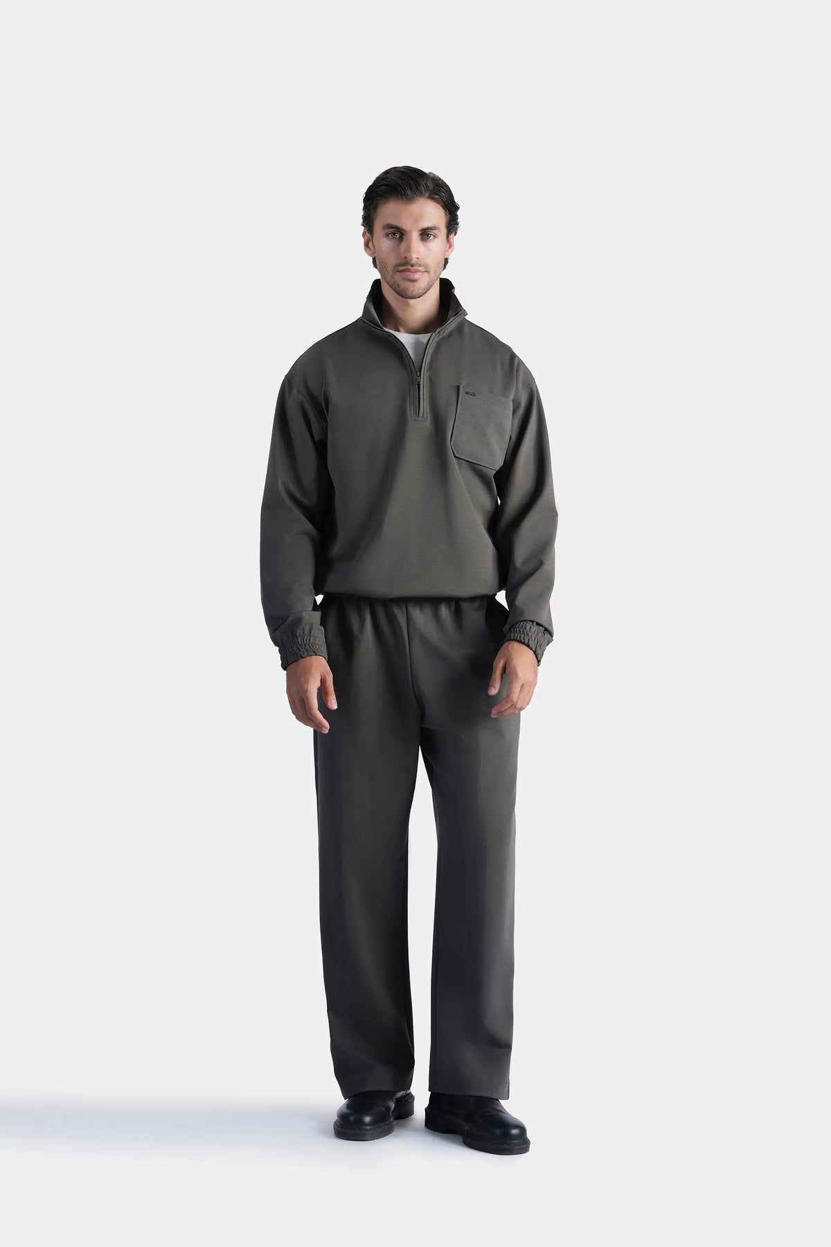 Grey quarter-zip mock neck pullover sweatshirt with relaxed fit and ribbed hem