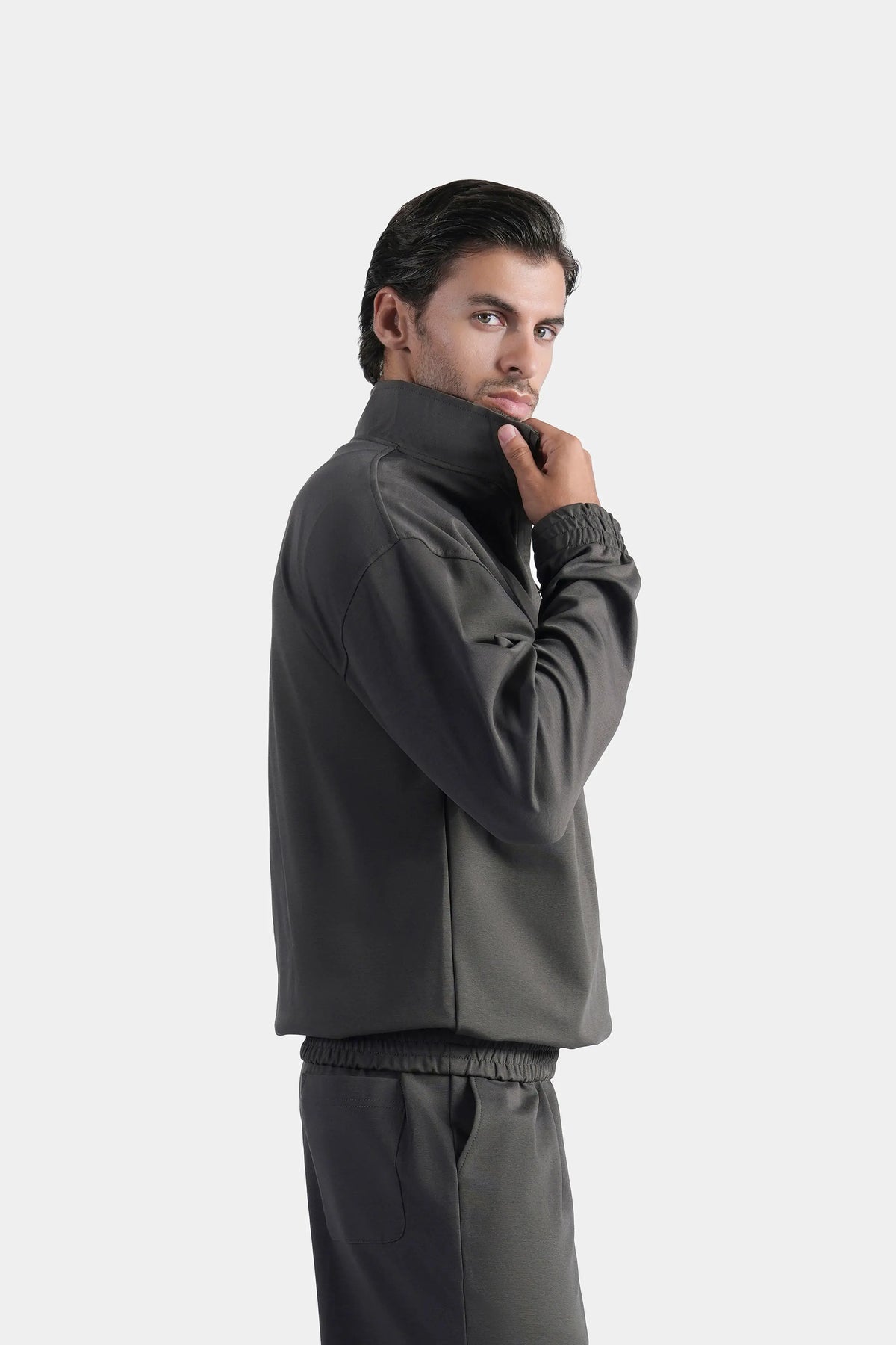 Grey quarter-zip mock neck pullover sweatshirt, side view with zip collar detail