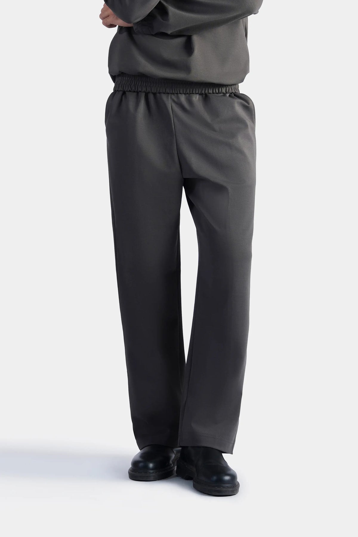 Grey scuba trousers with gathered elastic waistband and straight cuffs