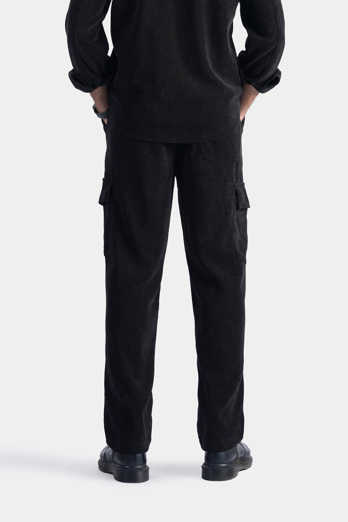 Black corduroy cargo trousers with two leg flap cargo pockets
