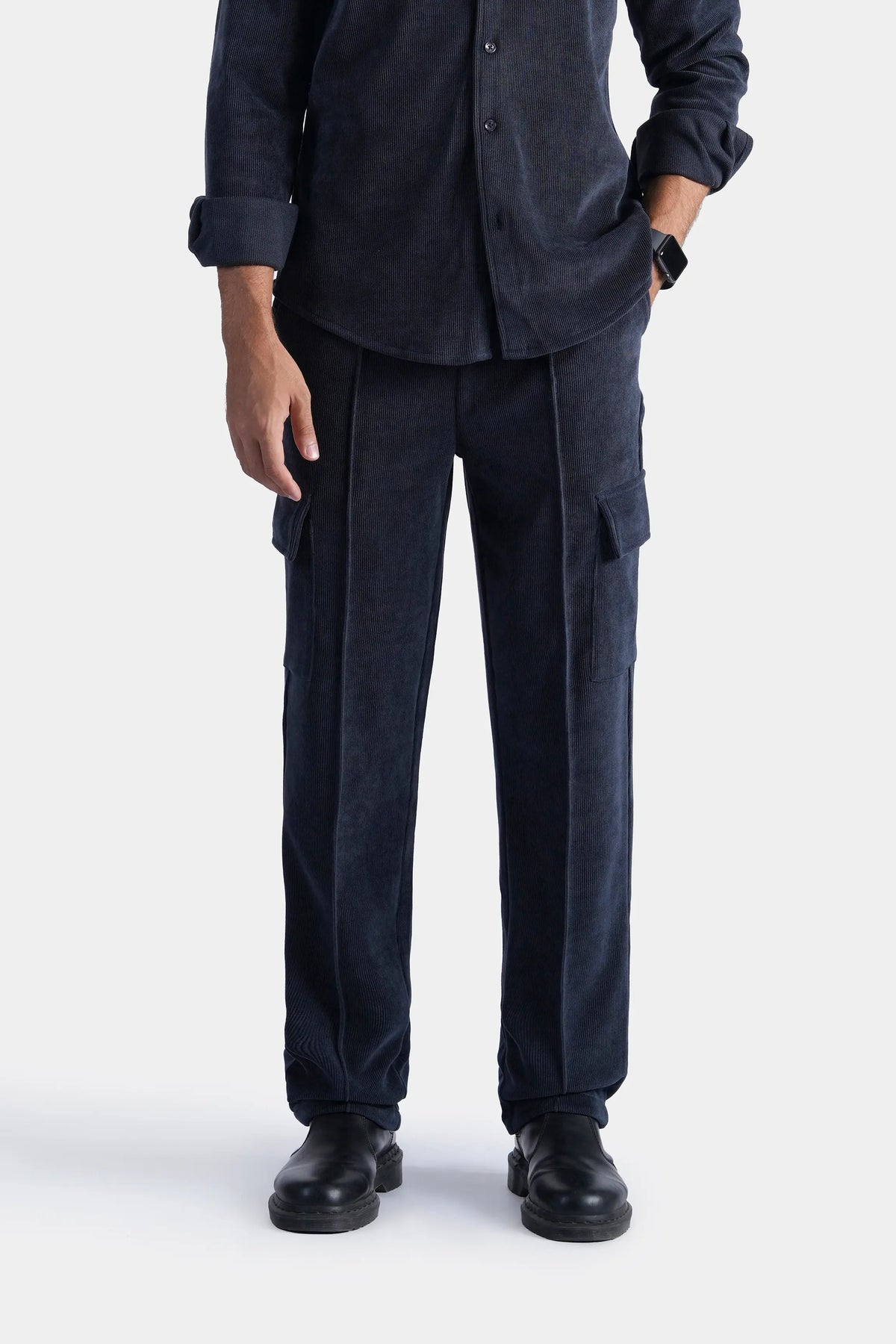 Dark navy corduroy cargo trousers with side pockets, relaxed straight fit