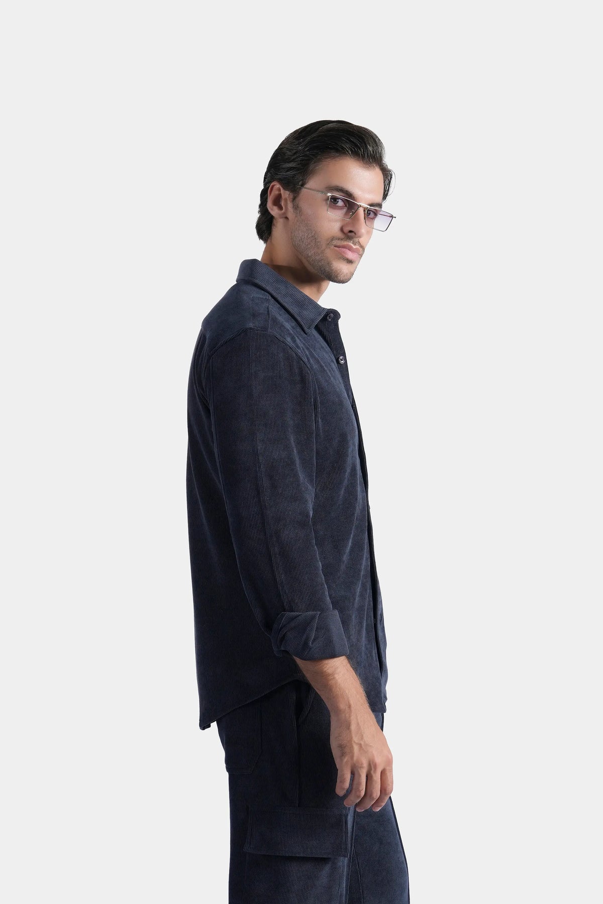 Navy button-up shirt, regular collar, shown from side with long sleeves