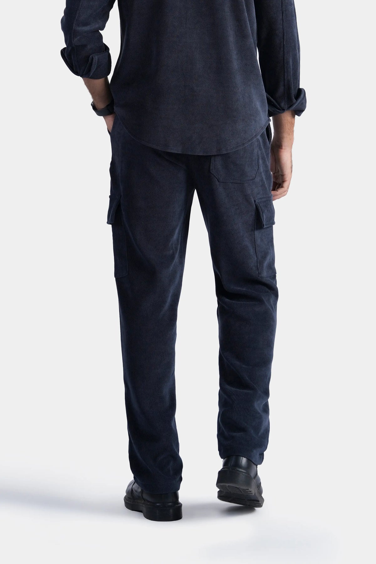 Navy corduroy cargo trousers with cargo flap pockets and relaxed ankle length