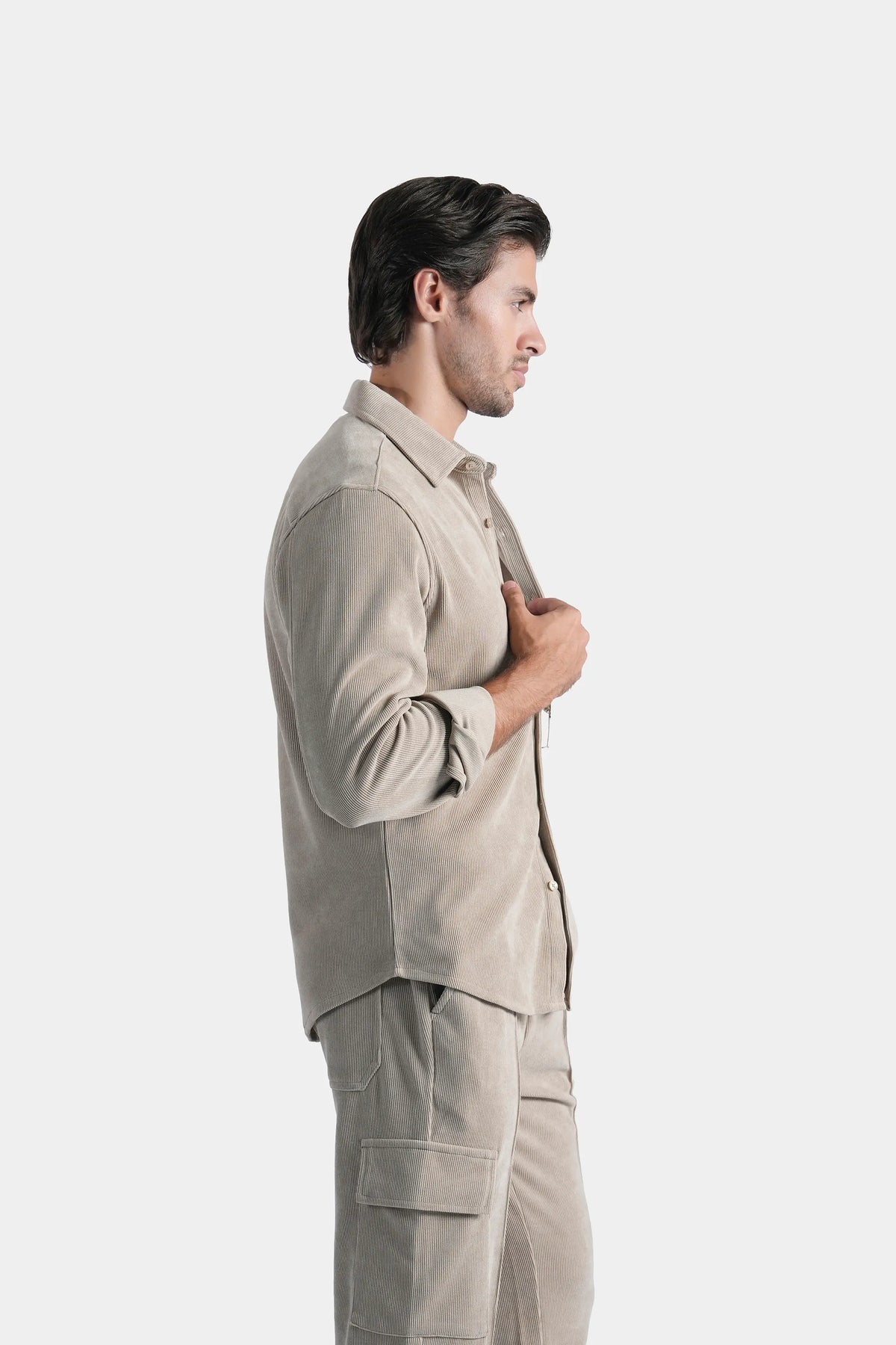 Stone casual button-up shirt with regular collar, shown from side profile
