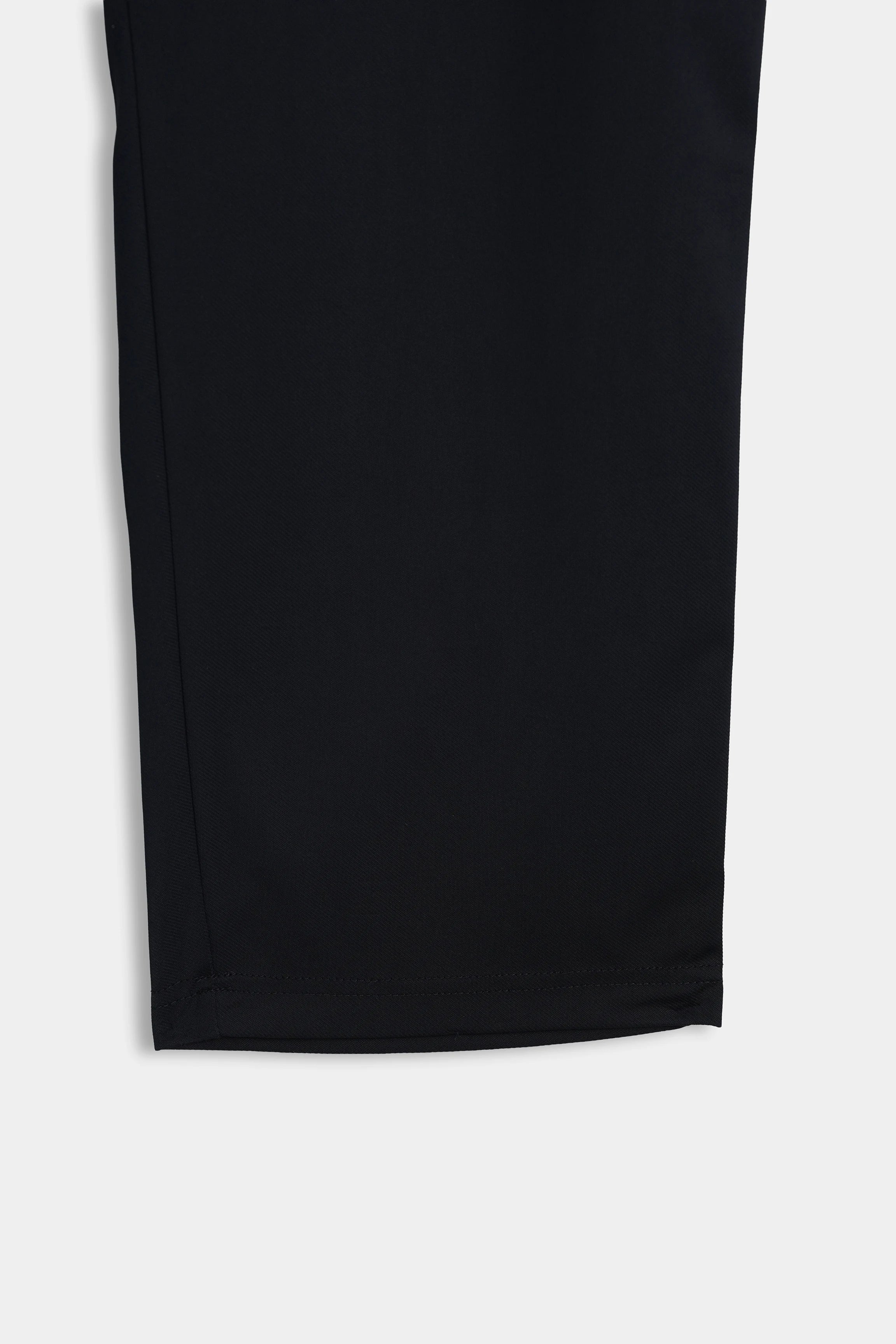 Black trouser leg section with smooth fabric finish and straight, relaxed cut