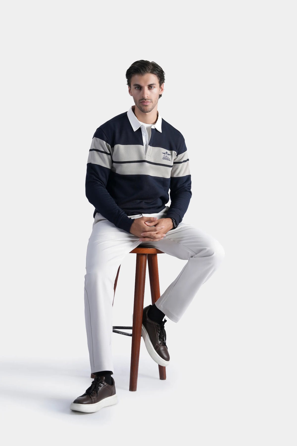 Navy long-sleeve rugby polo shirt with white chest stripes and buttoned collar