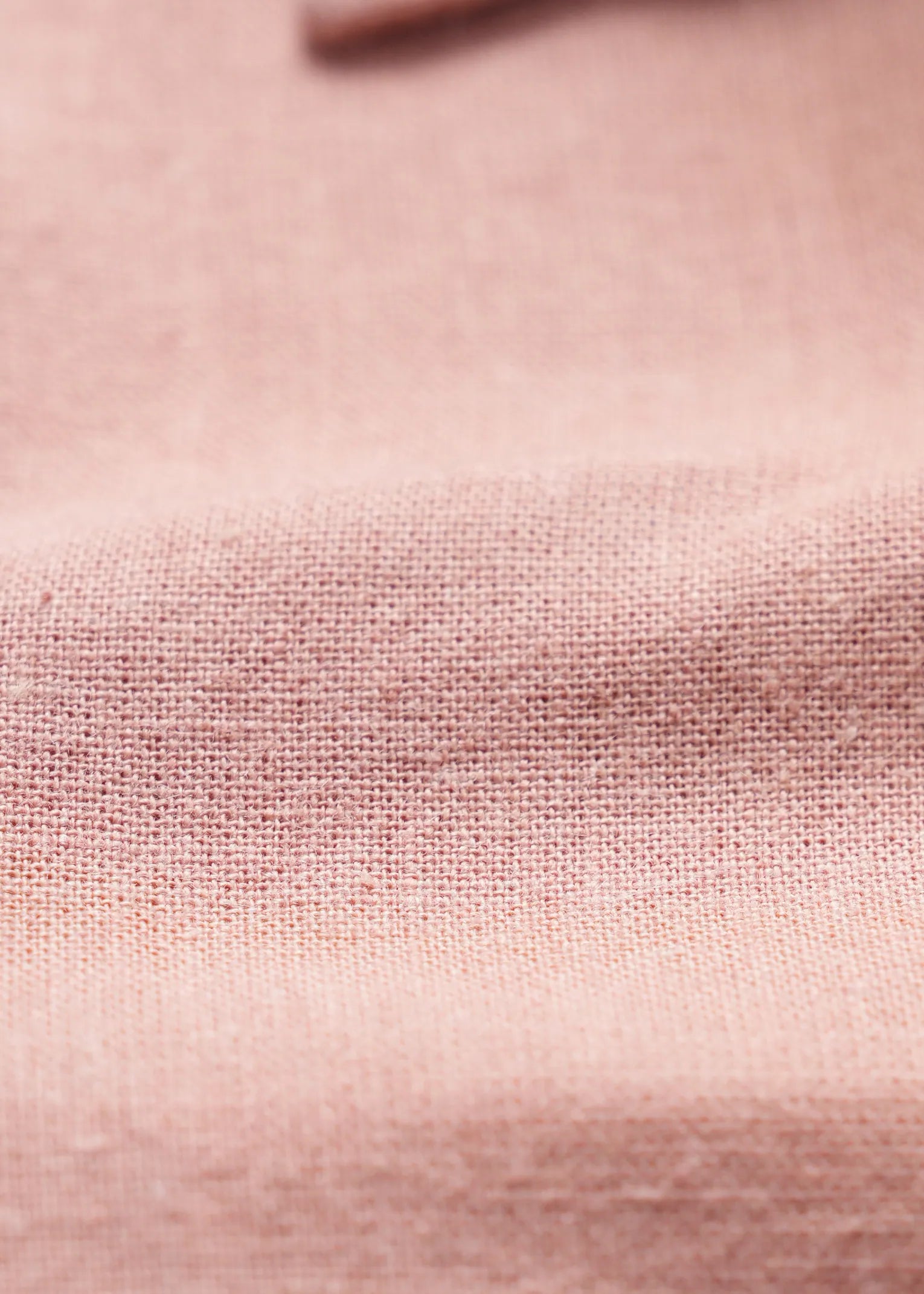 Peach linen fabric weave texture