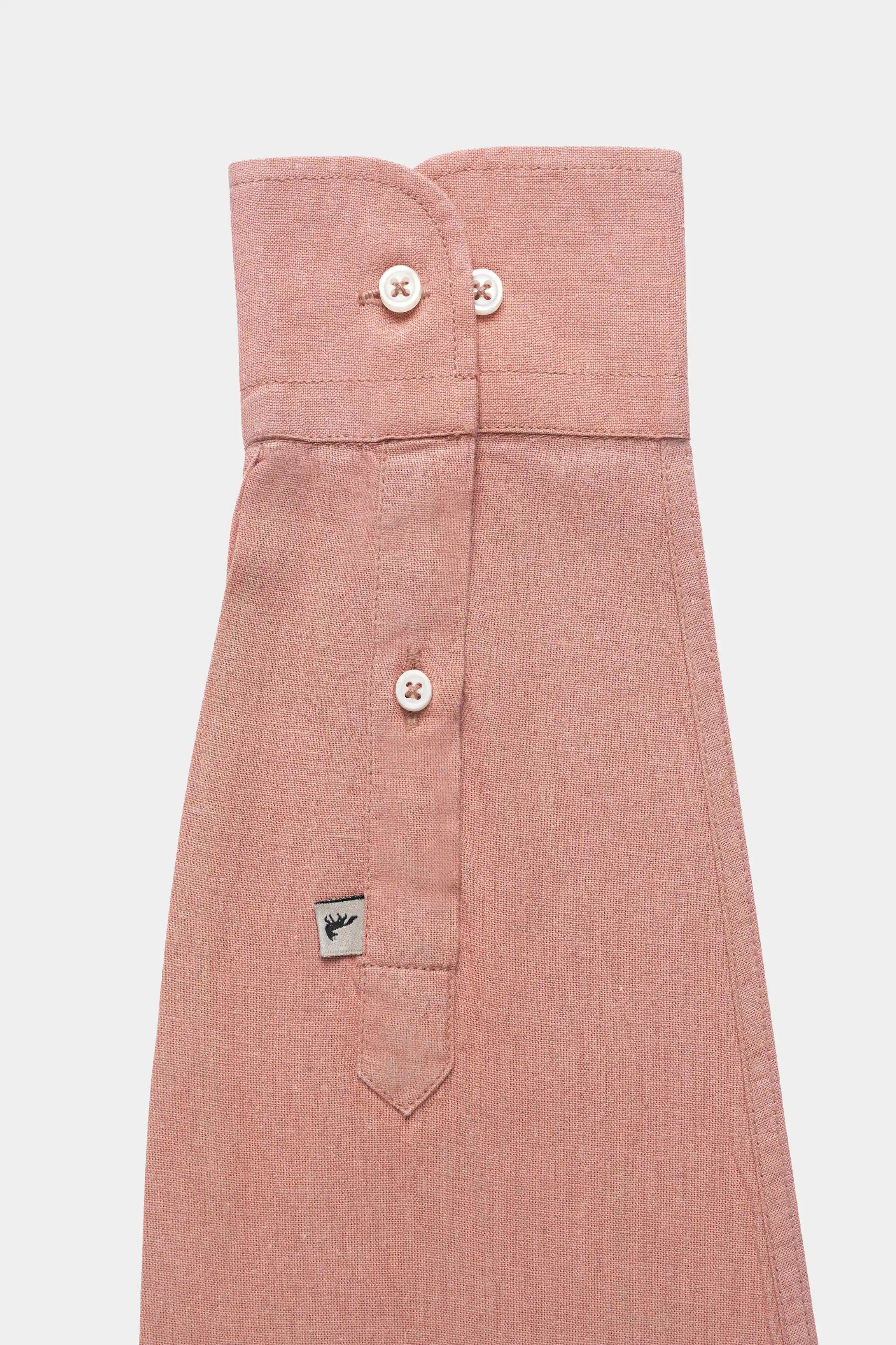 Peach linen shirt with small collar, button front, and chest pockets