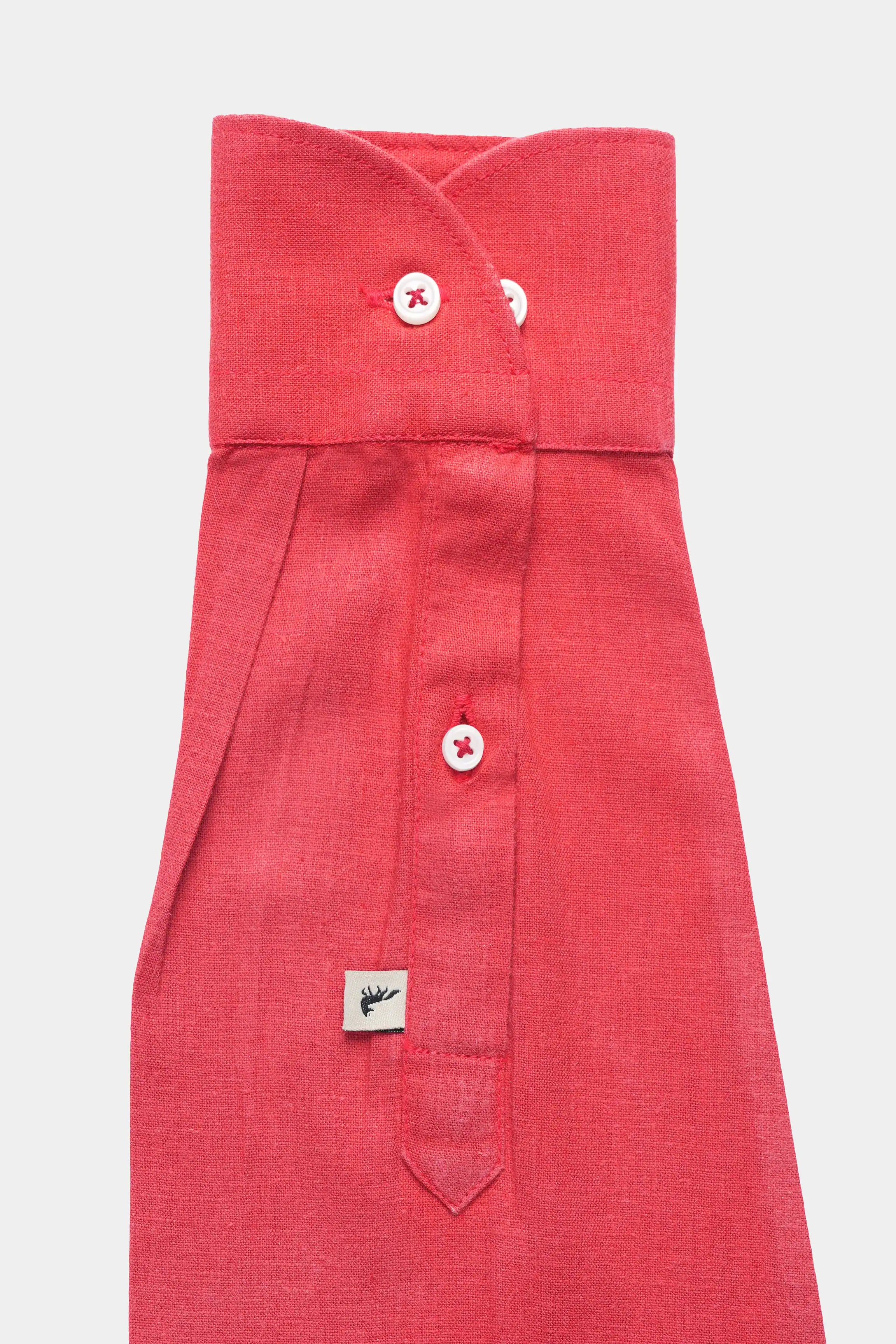 Tangerine linen shirt front with wide collar, buttons, and chest pocket