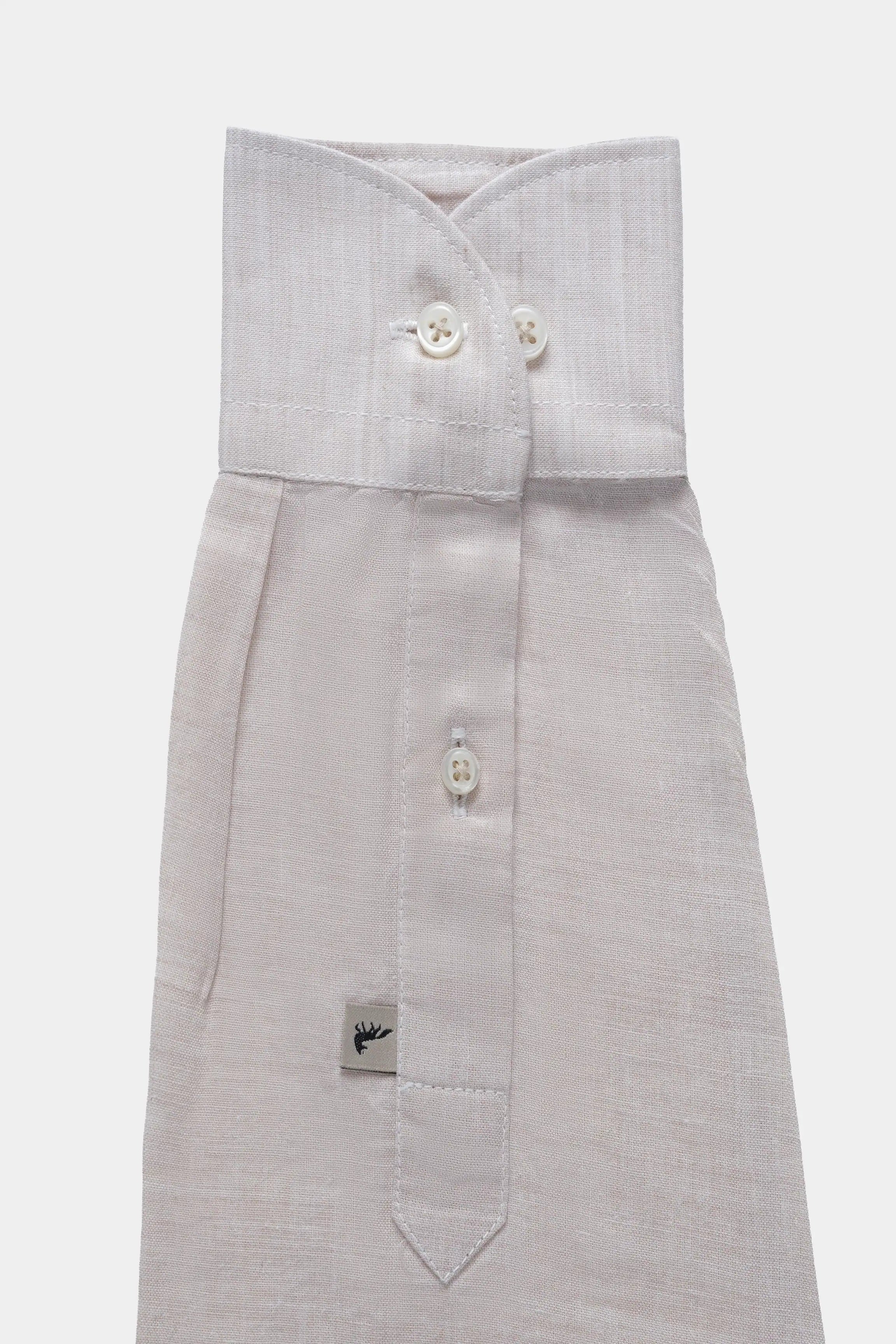 Light oatmeal linen wide collar shirt with button placket and hanging tag