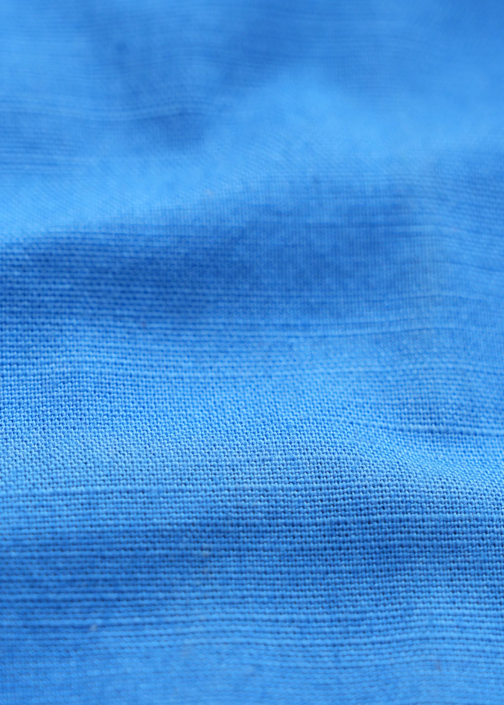 Blue linen fabric close-up texture