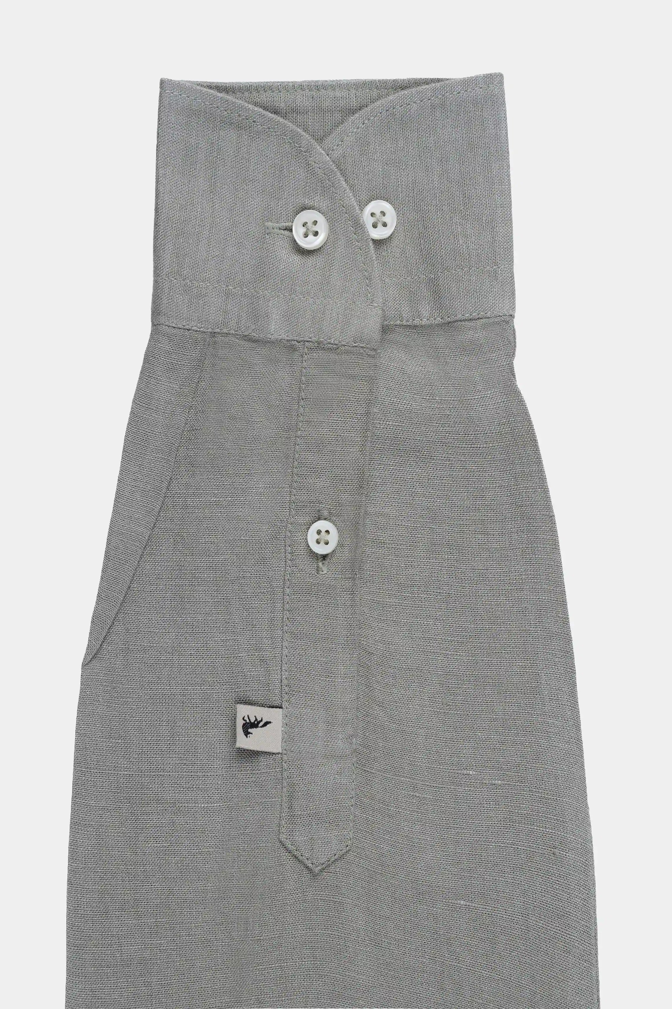 Light gray linen shirt with wide spread collar, buttons, and chest pocket