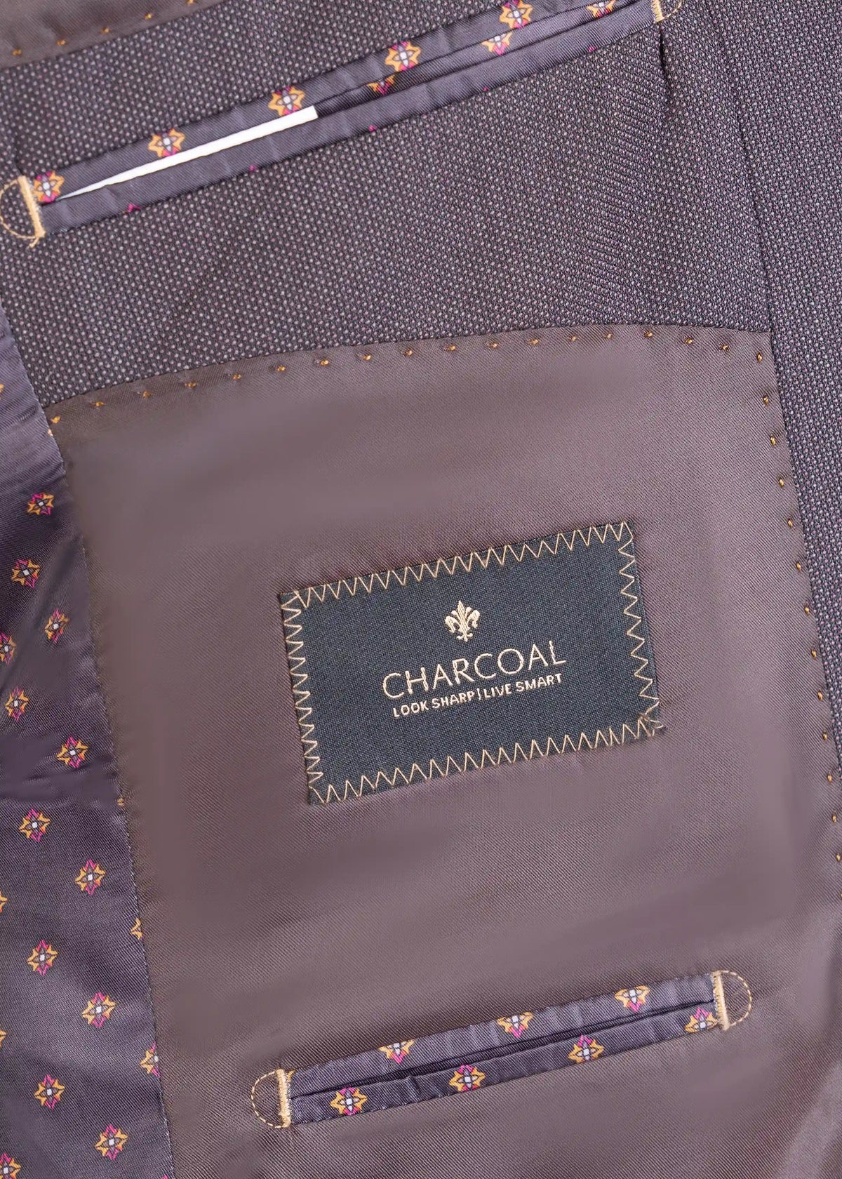 Dark brown suit jacket interior lining with CHARCOAL look sharp label and trim