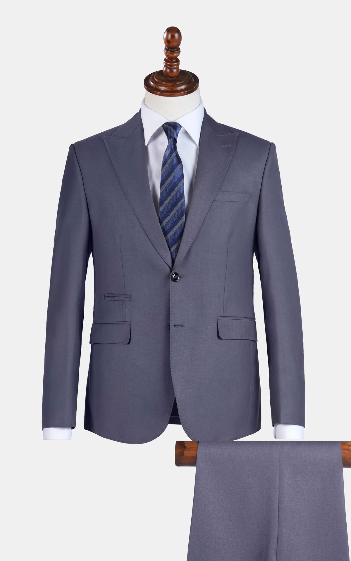 Slim-fit grey suit jacket with notch lapels and flap pockets, matching trousers